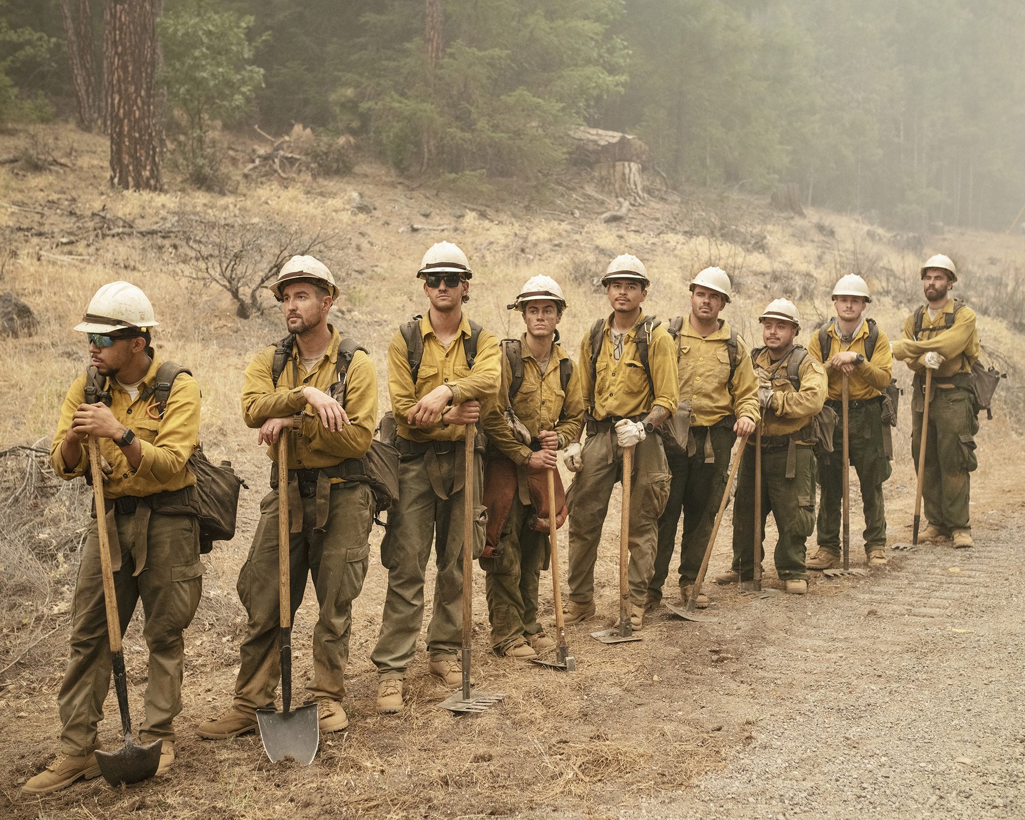  Firefighters fighting the Dixie Fire, the largest single fire in California's history, on July 25, 2021. The blaze, which started on July 13, had burned more than 554,000 acres by Aug. 15 and was only 31% contained. Crescent Mills, California. For  