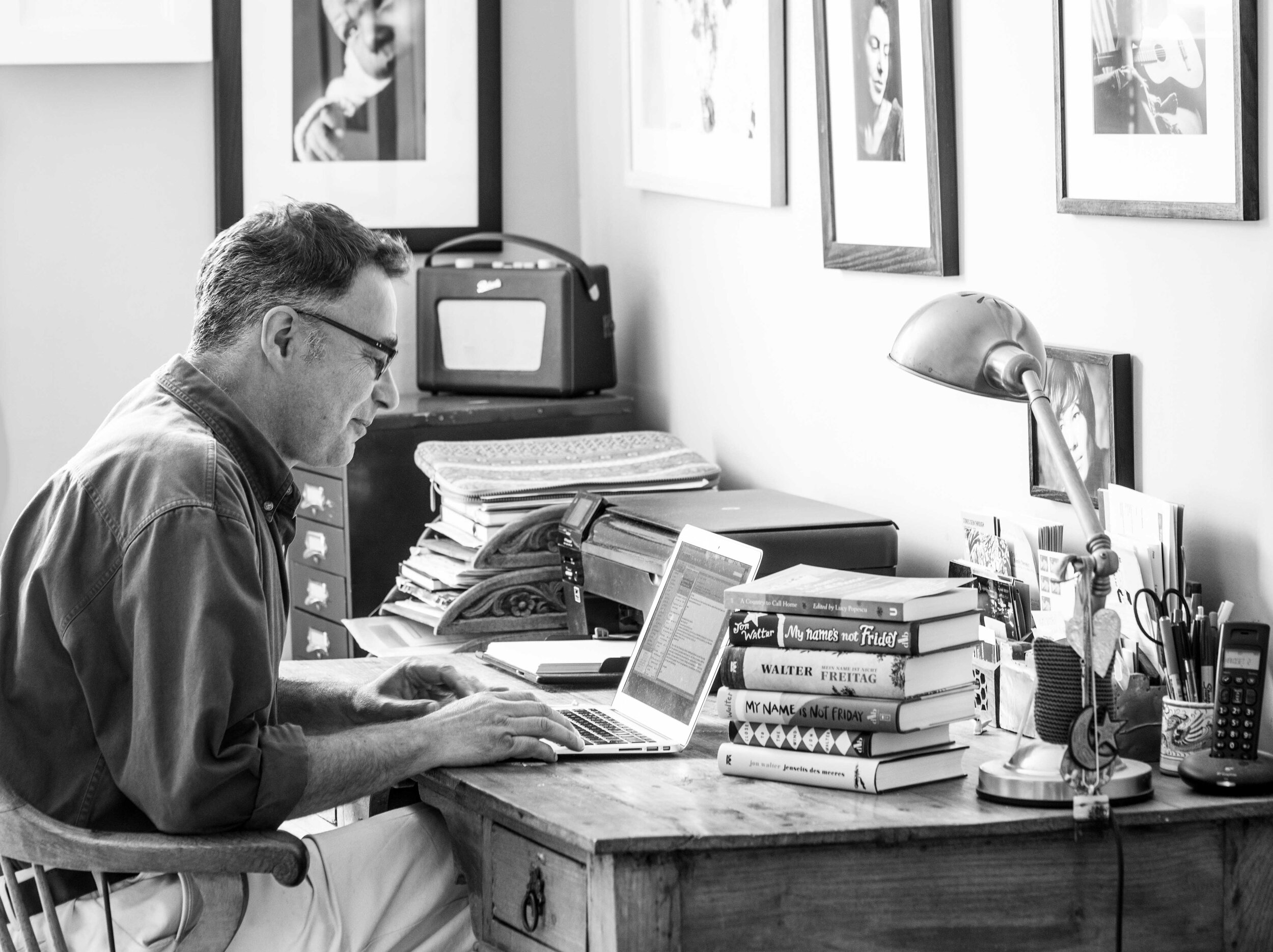 Writer Jon Walter at desk