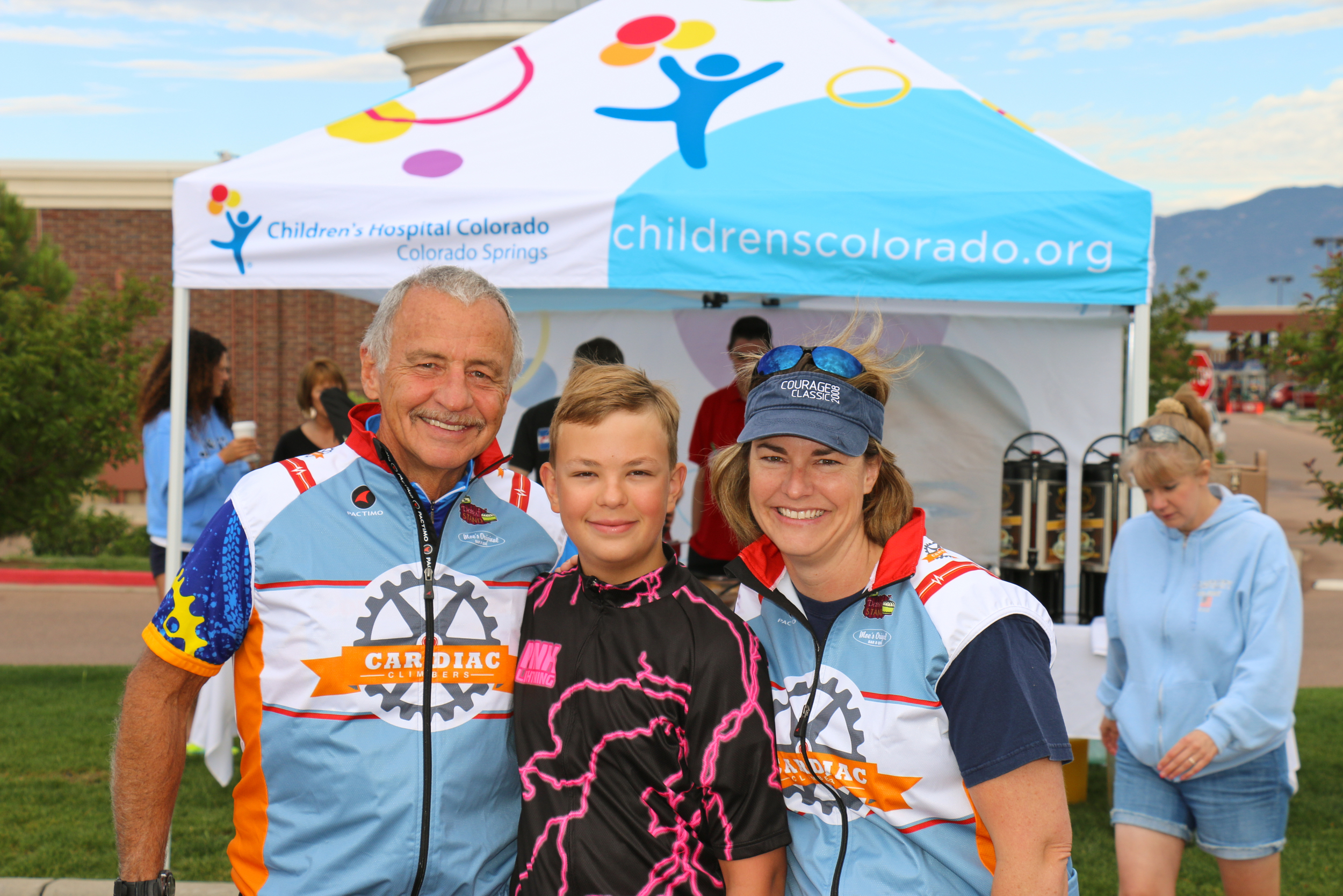 Noah, the 2014 patient ambassador with his mom and grandpa