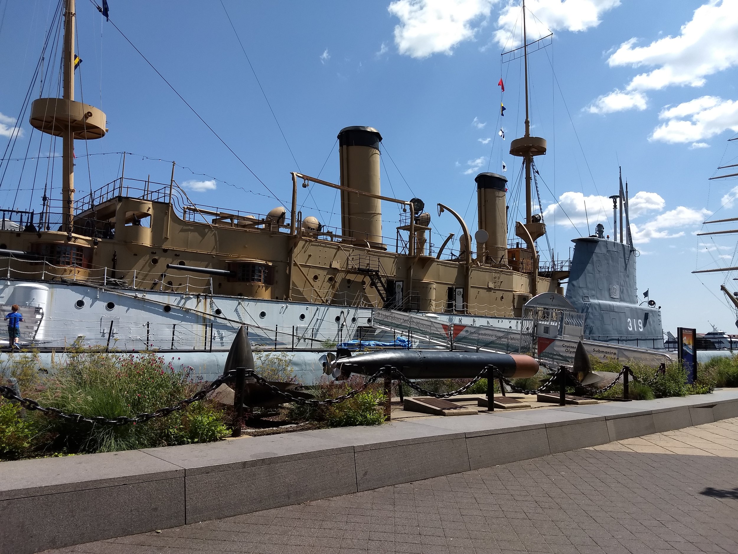 Historic cruiser ship and submarine docked at Penn's Landing, Philadelphia.