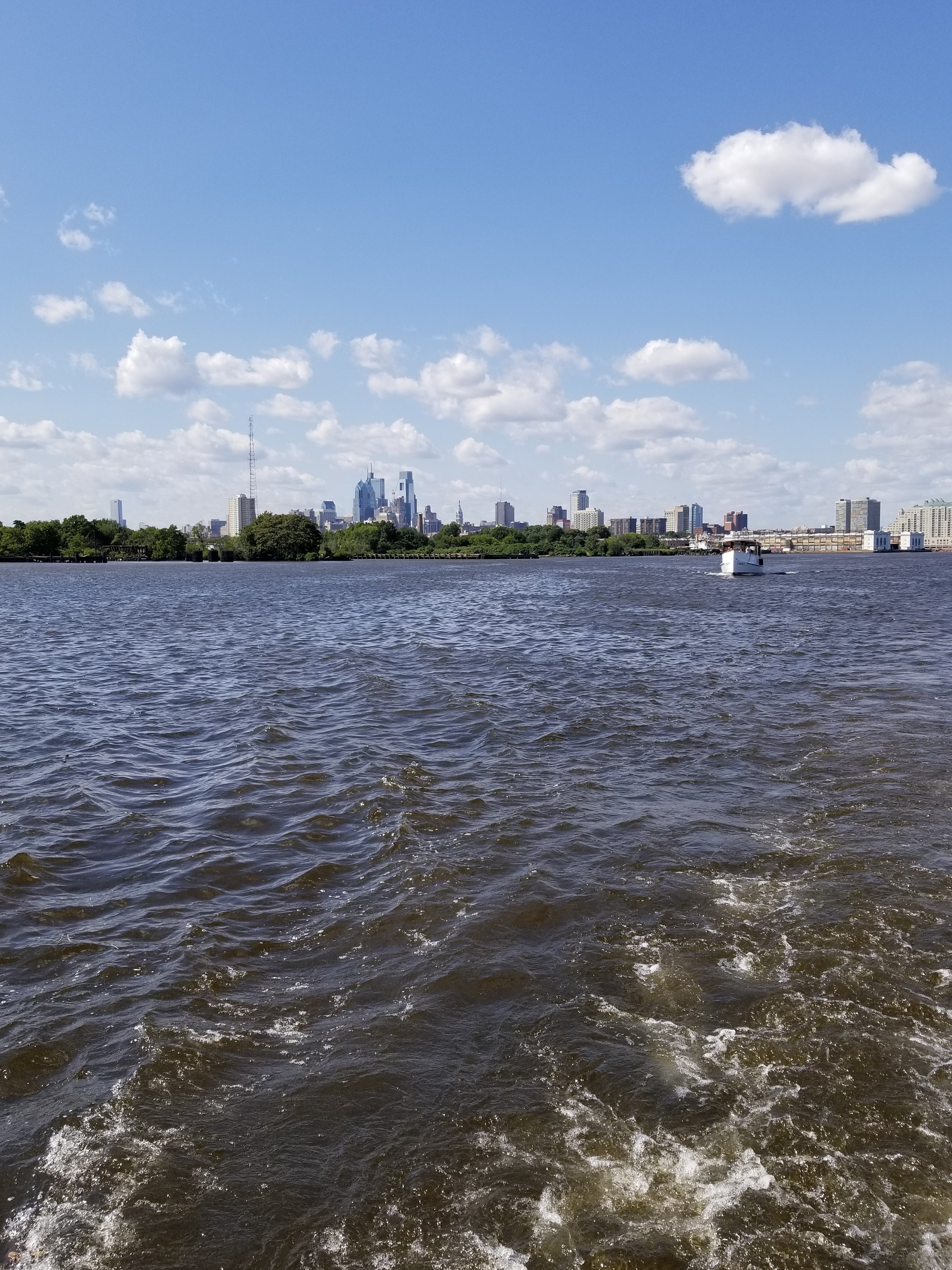 Sailing down the Delaware River with Philadelphia's beautiful skyline slowly fading