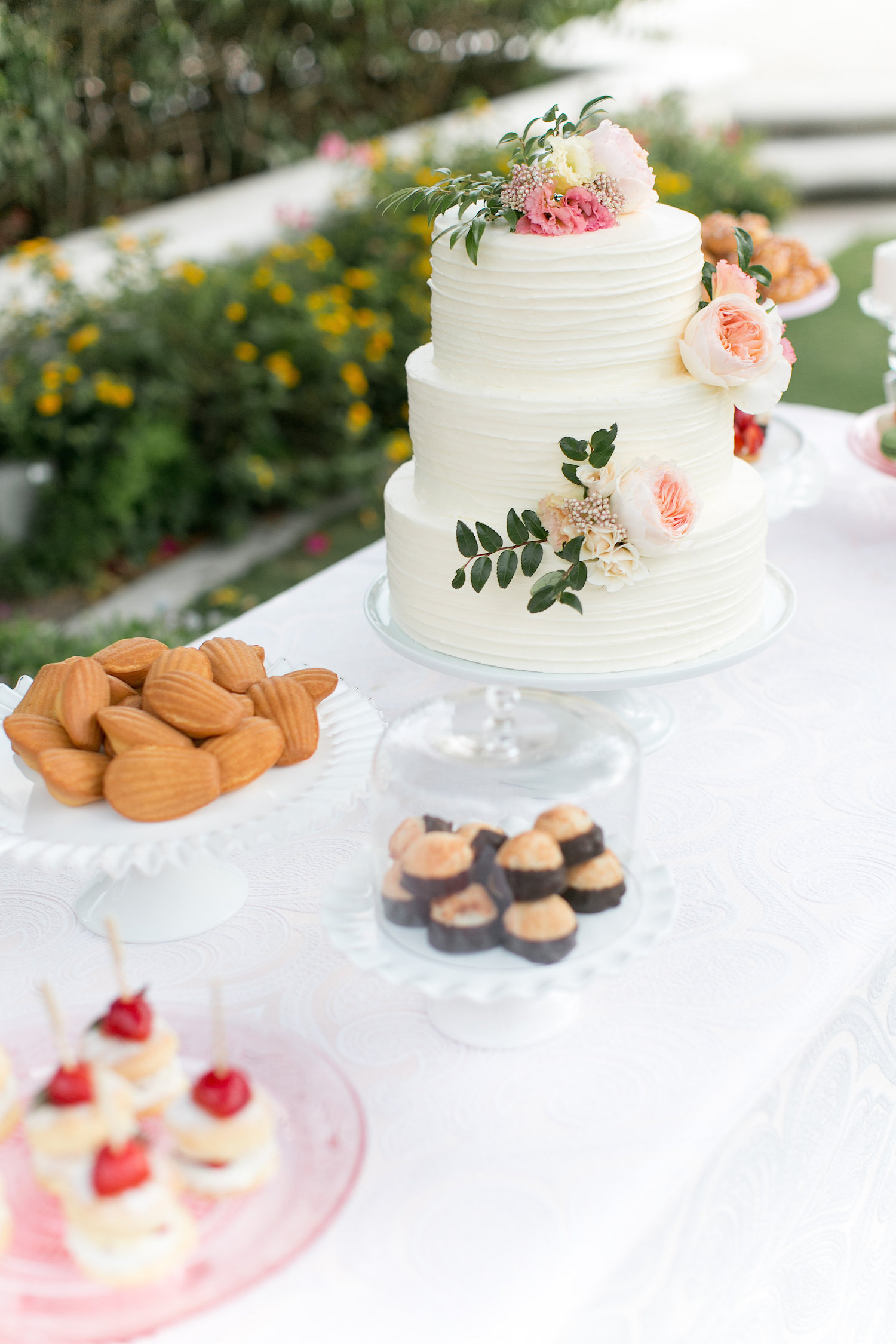 Garden rose wedding cake decorated by San Diego Florist, Compass Floral.