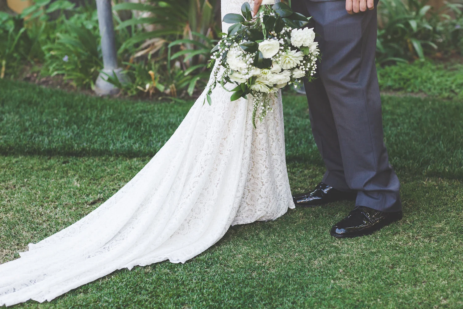 Green & white bridal bouquet by San Diego wedding florist, Compass Floral.
