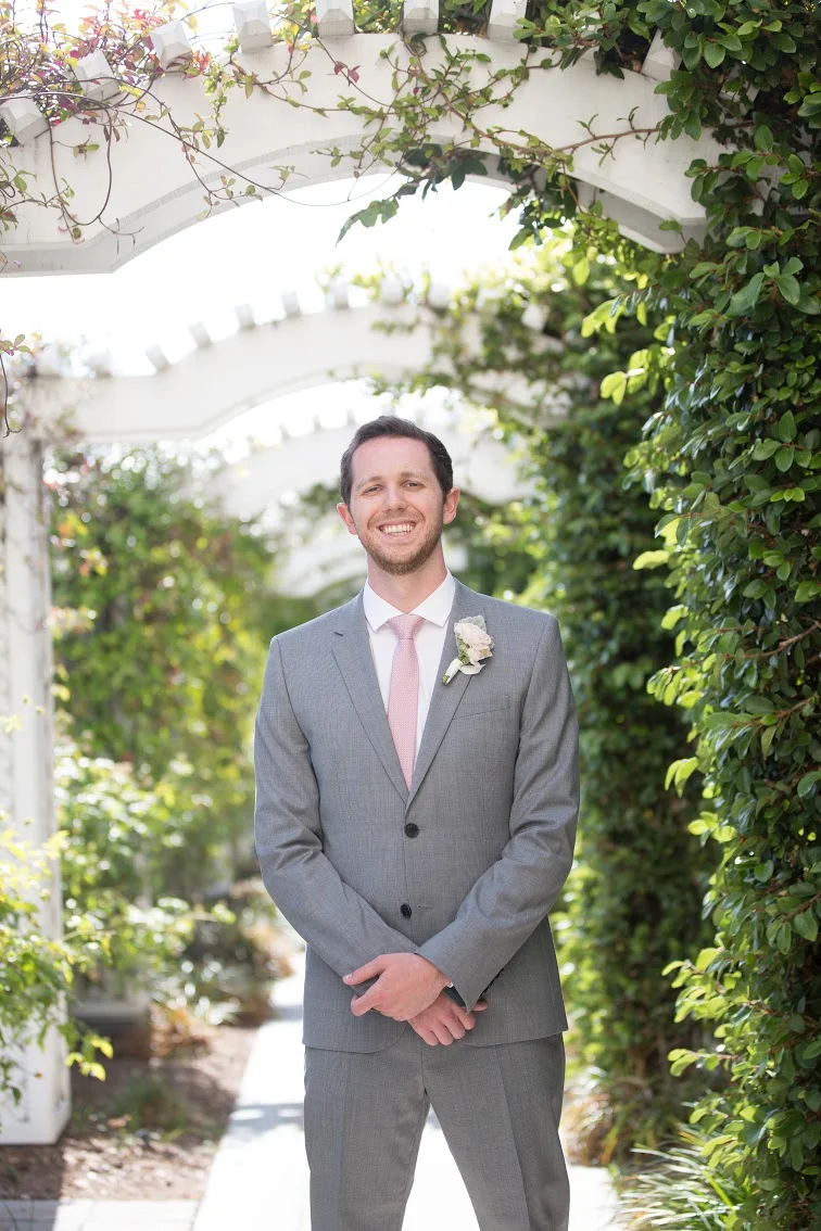 Blush grooms boutonniere by San Diego wedding florist, Compass Floral.