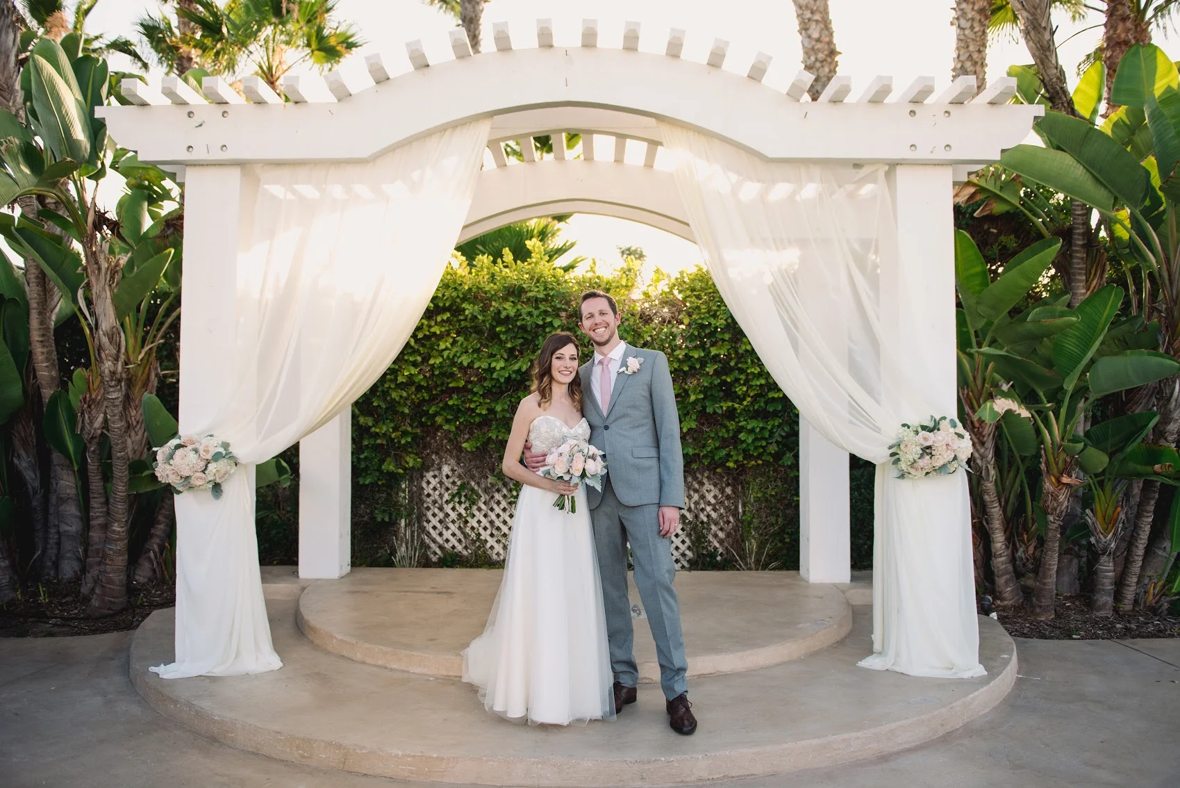 Champagne & blush wedding ceremony by San Diego wedding florist, Compass Floral.