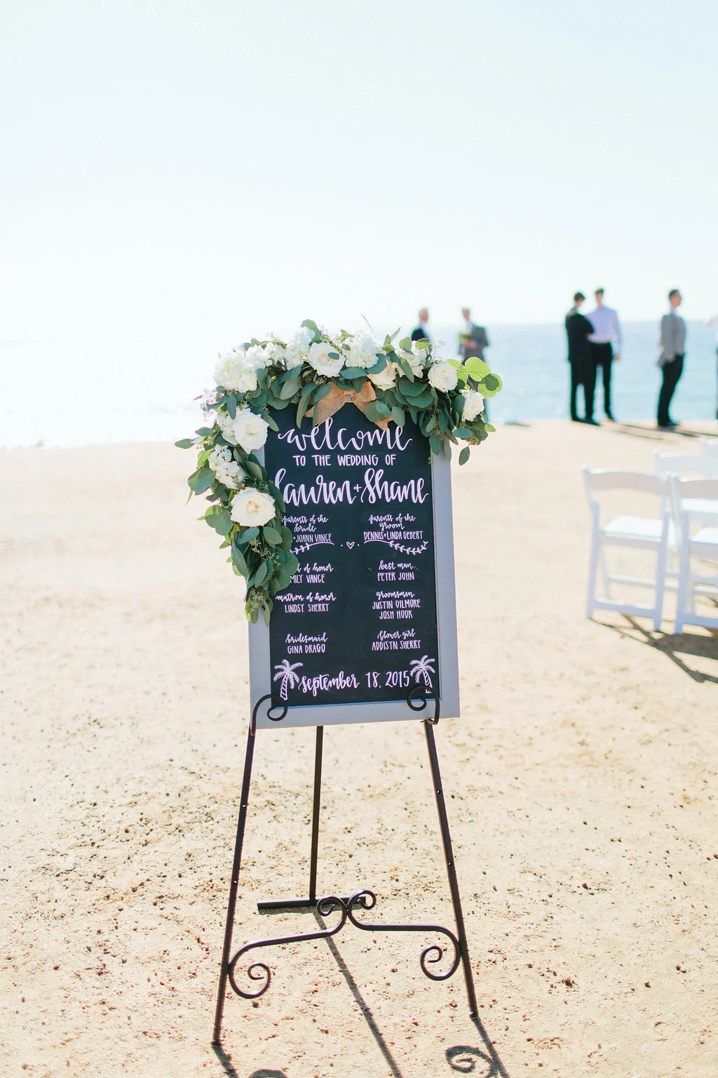Blush & ivory sign garland | Sunset Cliffs beach wedding ceremony | La Jolla Weddings | Compass Floral Design | Wedding Florist in San Diego and Southern California | Aga Jones Photography.