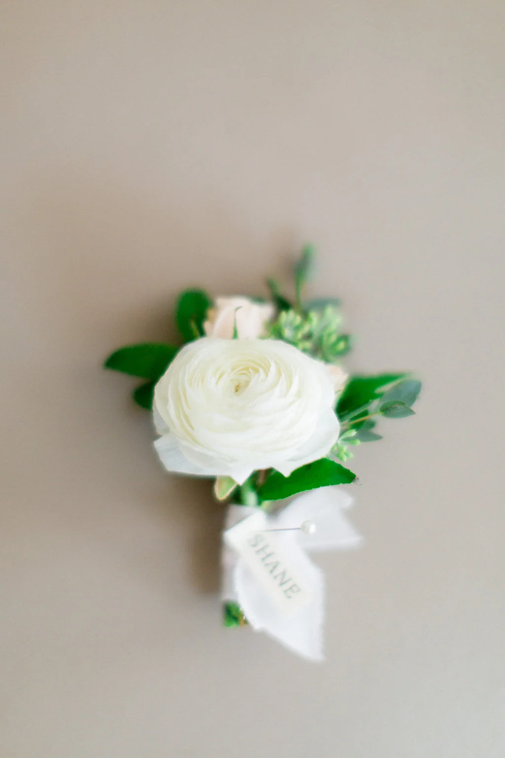 White ranunculus boutonniere | La Jolla Weddings | Compass Floral Design | Wedding Florist in San Diego and Southern California | Aga Jones Photography