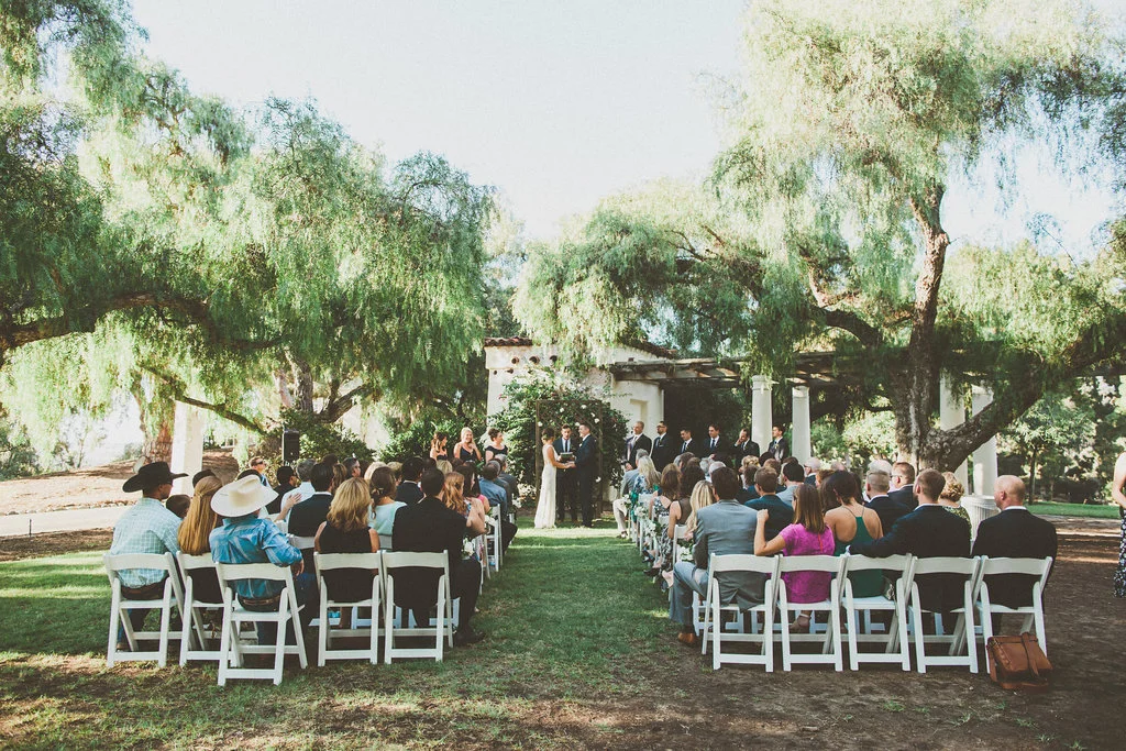 Green & white wedding ceremony by San Diego wedding florist, Compass Floral.
