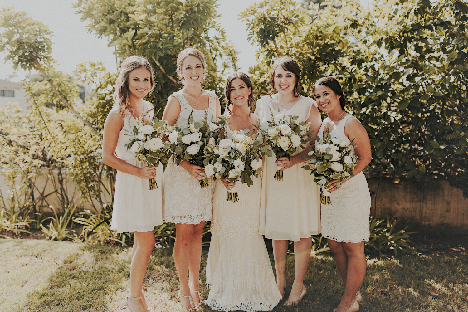 White garden rose & herb bouquets by San Diego wedding florist, Compass Floral.