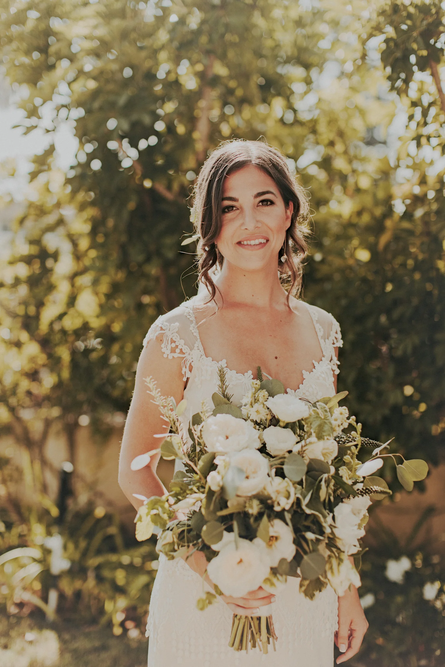 White garden rose & herb bridal bouquet by San Diego wedding florist, Compass Floral.