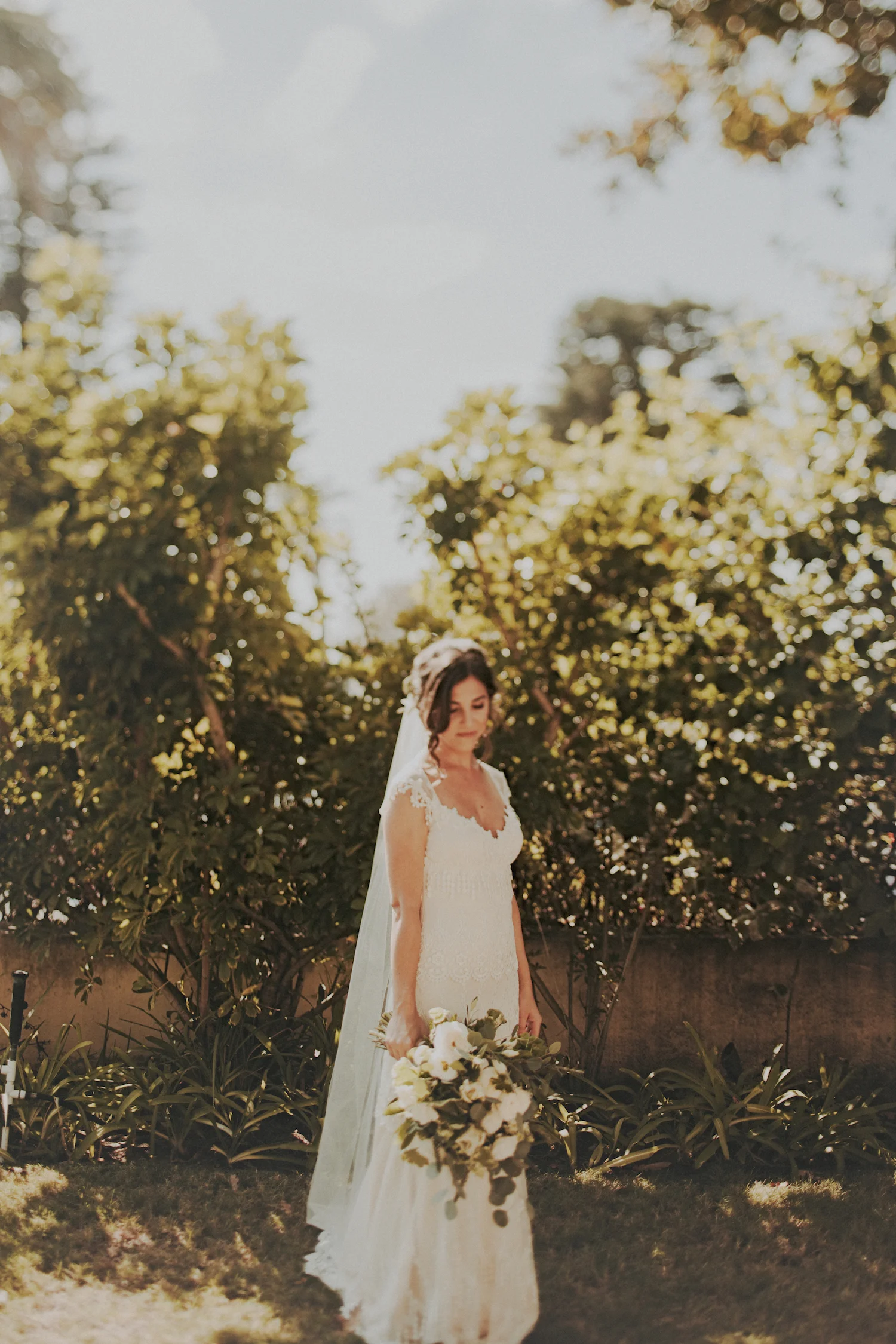 White garden rose & herb bridal bouquet by San Diego wedding florist, Compass Floral.