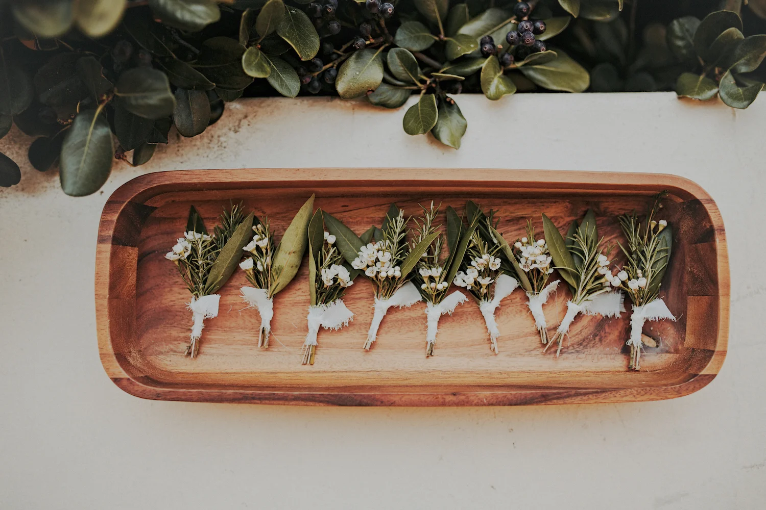 Garden romantic green & white herb boutonnieres by San Diego wedding florist, Compass Floral.