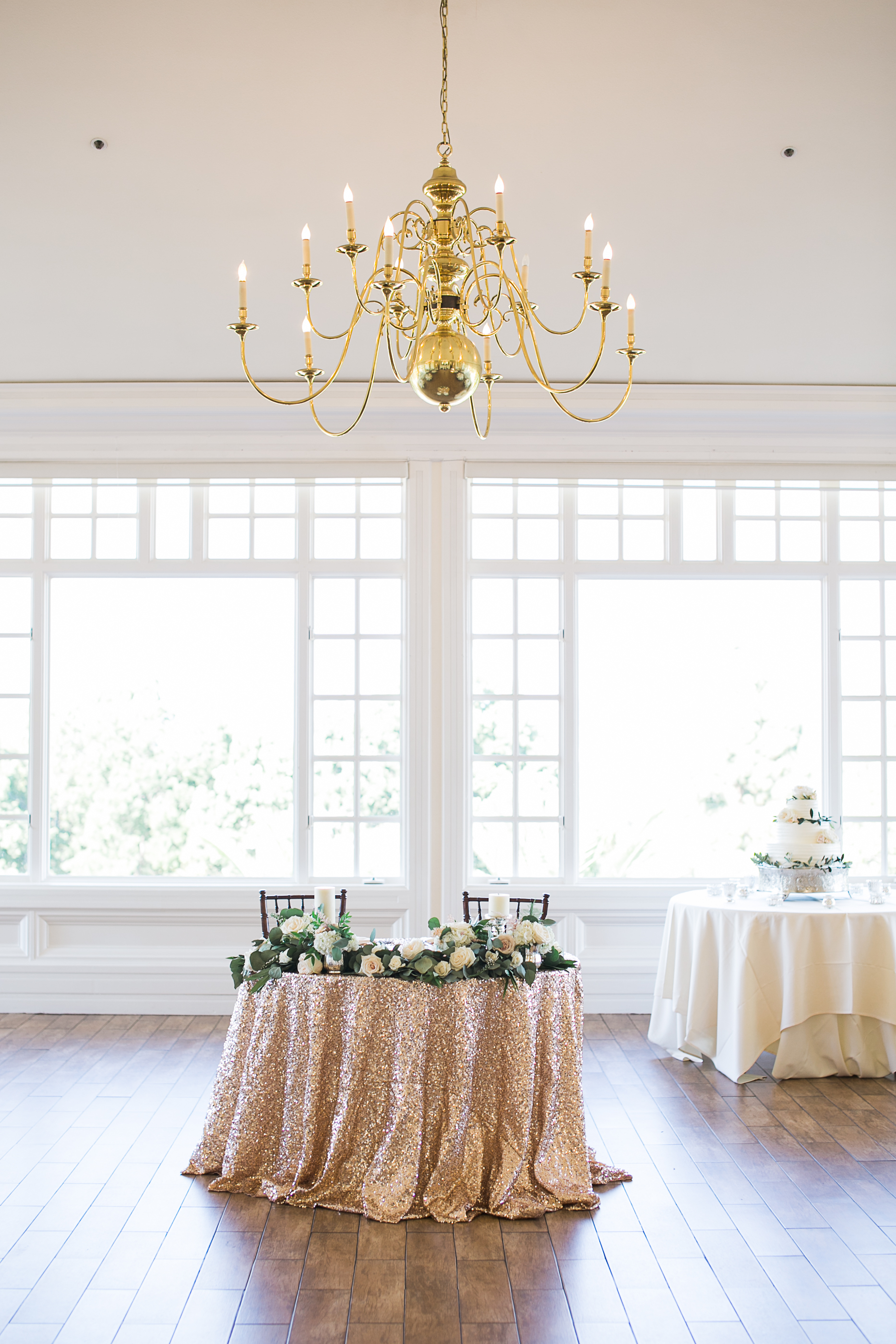 Carmel Mountain Ranch Country Club Blush & ivory, garden romantic wedding by San Diego wedding florist, Compass Floral. Brandi Welles Photography. Gold sequin sweetheart table.