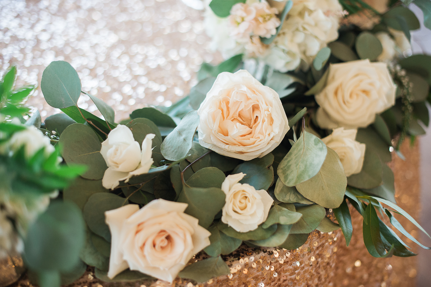 Carmel Mountain Ranch Country Club Blush & ivory, garden romantic wedding by San Diego wedding florist, Compass Floral. Brandi Welles Photography. Gold sequin & garland sweetheart table.