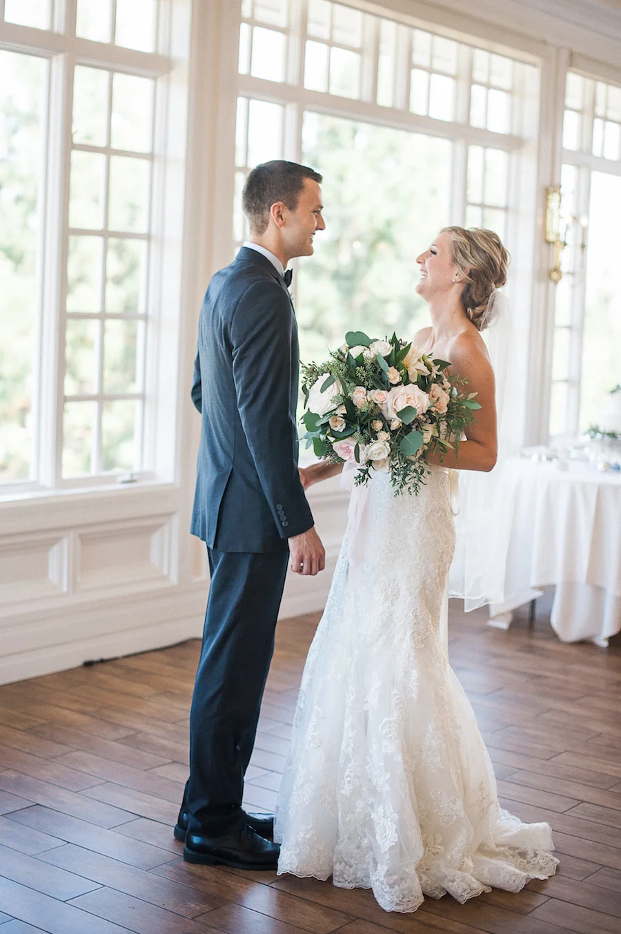 Carmel Mountain Ranch Country Club Blush & ivory, garden romantic bridal bouquet by San Diego wedding florist, Compass Floral. Brandi Welles Photography. First look.