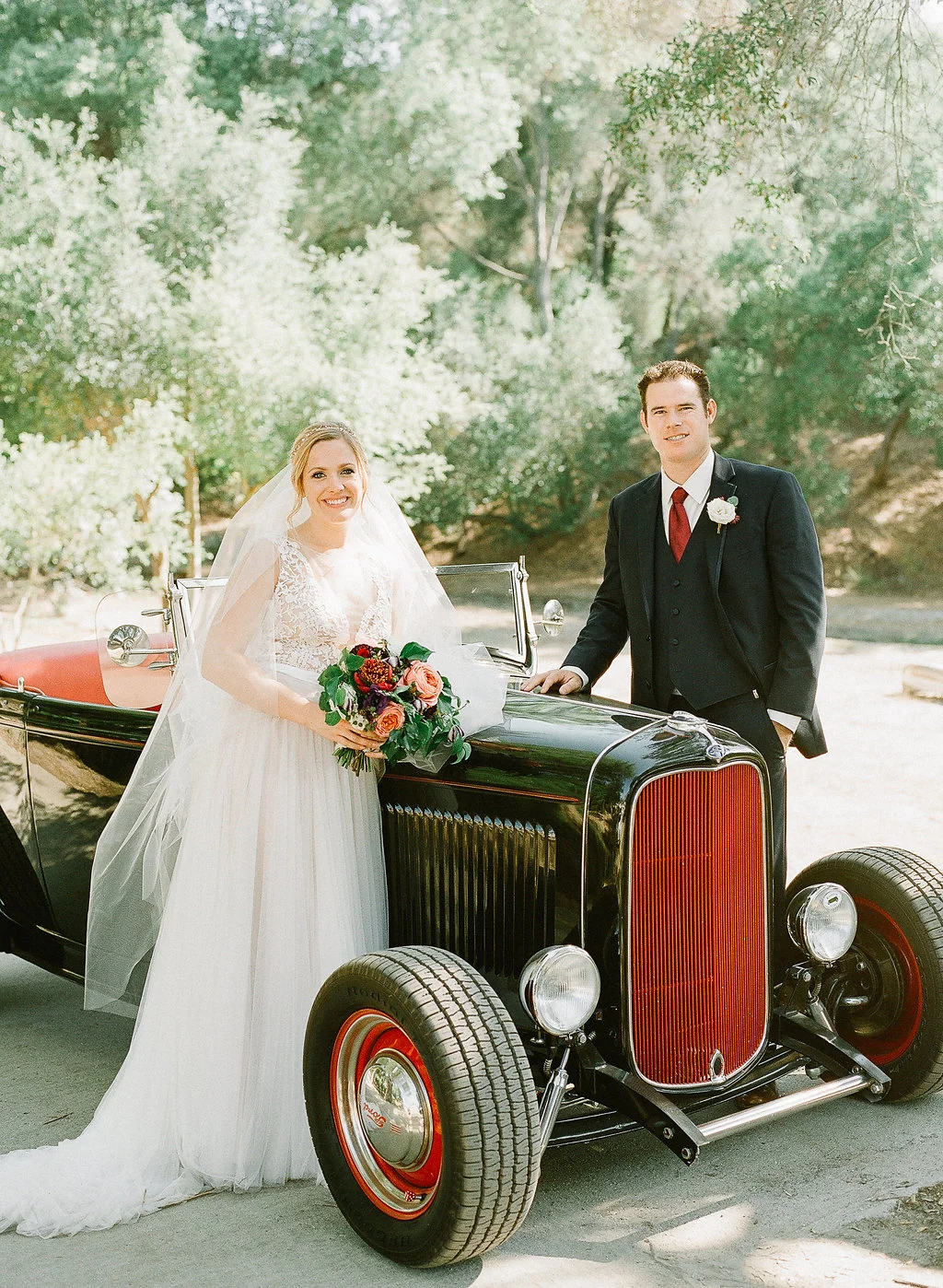 Vintage getaway car with florals by Compass Floral | Fallbrook Treehouse