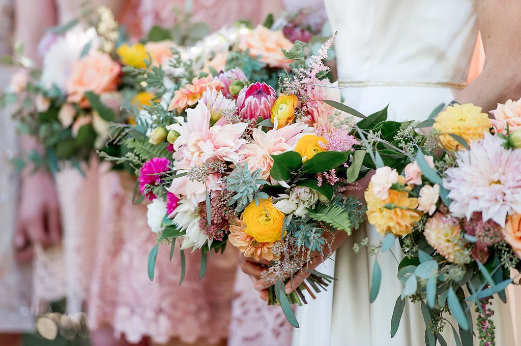 Cafe au lait dahlia, protea and ranunculus desert bohemian bridal bouquet by Compass Floral | Estancia Hotel & Spa, La Jolla.