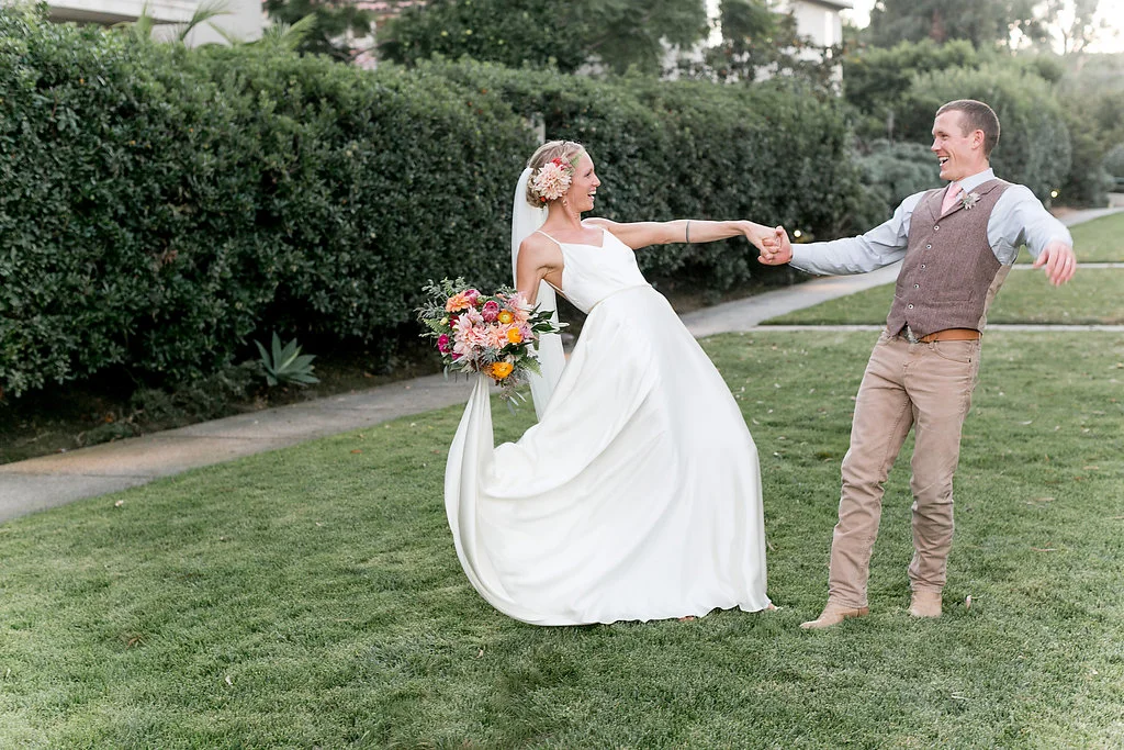 Bohemian bride & groom with bridal bouquet by Compass Floral | Estancia Hotel & Spa, La Jolla.