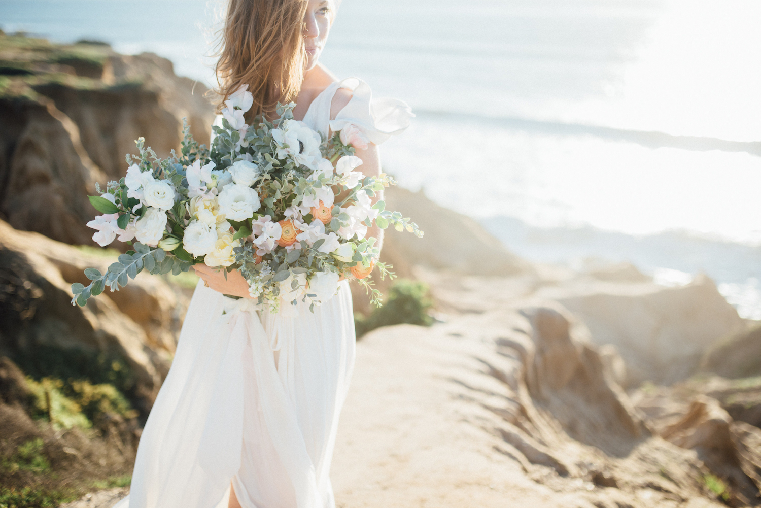 Ivory, blush & peach bridal bouquet by San Diego florist, Compass Floral // Eva Lin Photography.