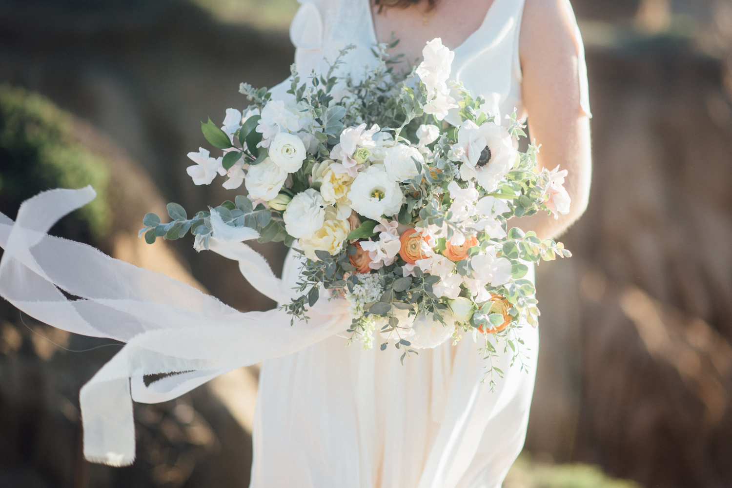 Ivory, blush & peach bridal bouquet by San Diego florist, Compass Floral // Eva Lin Photography.