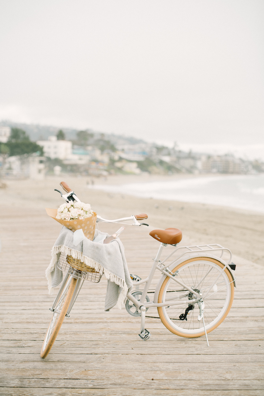 Blooms & beach cruiser basket by Compass Floral. Design & Planning // Events by Talissa Photographer // Garrett Richardson
