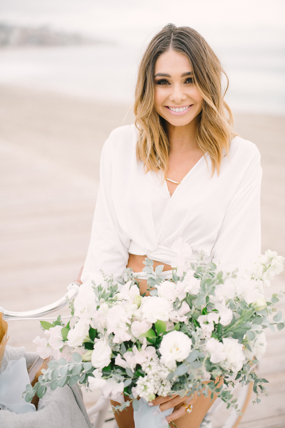 Bachelor contestant Sarah Vendal with summer bouquet of lilac, sweet pea and lisianthus by Compass Floral. Design & Planning // Events by Talissa Photographer // Garrett Richardson