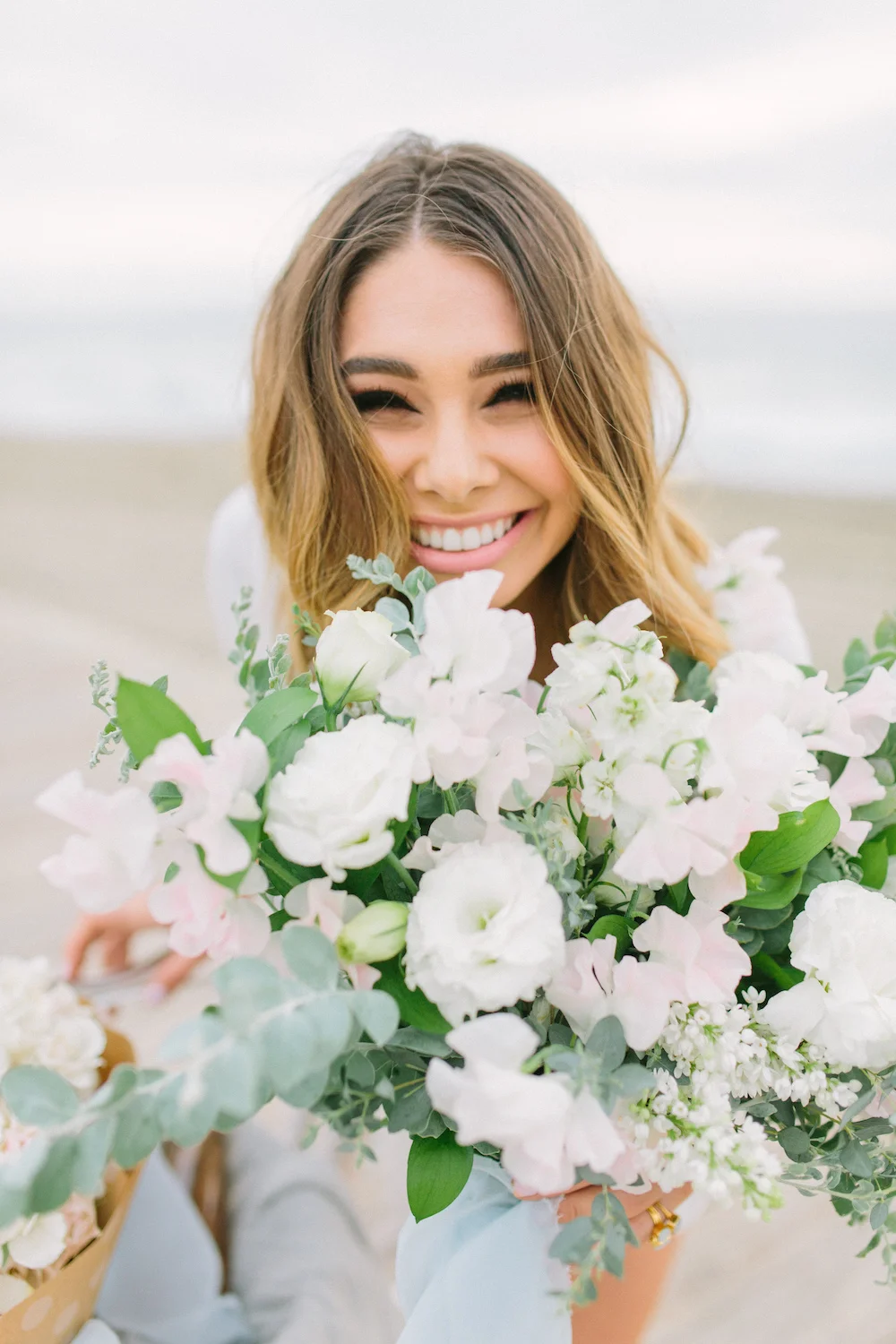 Bachelor contestant Sarah Vendal summer fun beach styled shoot. Bouquet by Compass Floral. Design & Planning // Events by Talissa Photographer // Garrett Richardson