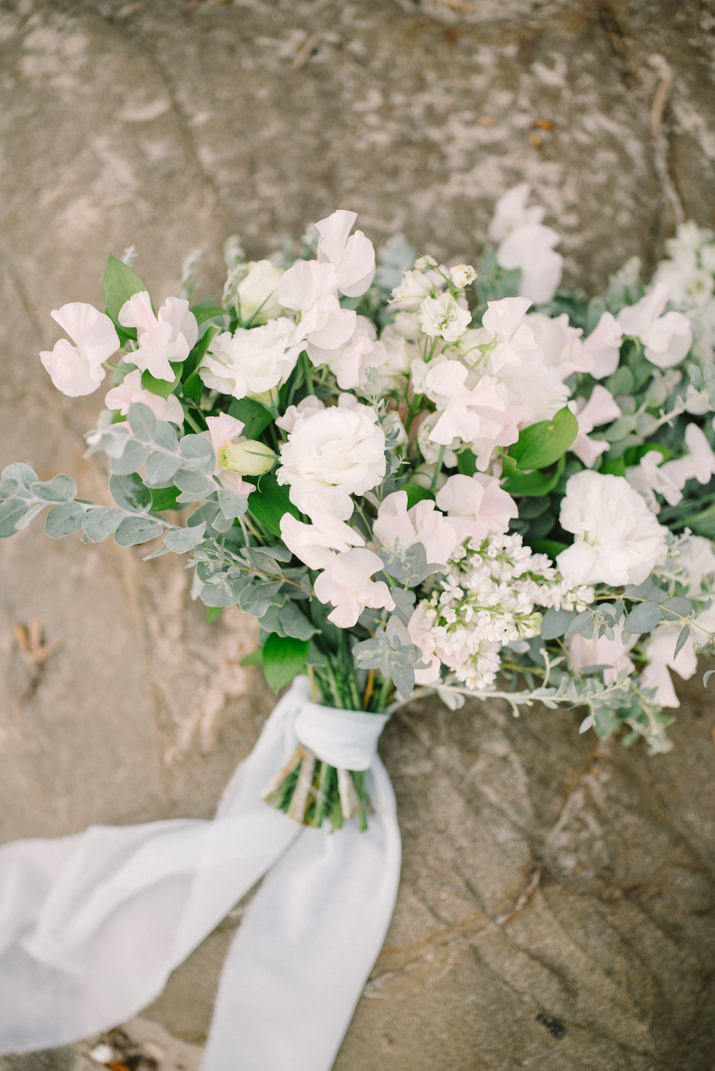 Green & ivory summer bouquet of lilac, sweet pea and lisianthus by Compass Floral. Design & Planning // Events by Talissa Photographer // Garrett Richardson