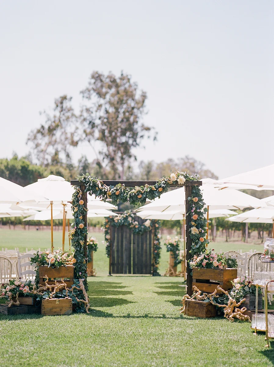 Garland wedding ceremony | Anthropologie inspired private estate wedding | Compass Floral | Wedding Florist in San Diego and Southern California | Shane & Lauren Photo