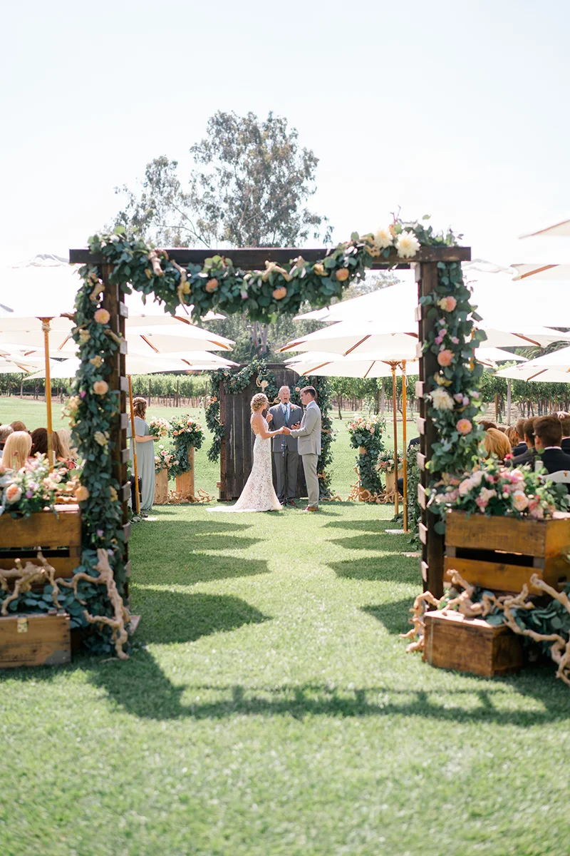 Wedding ceremony garland | Anthropologie inspired private estate wedding | Compass Floral | Wedding Florist in San Diego and Southern California | Shane & Lauren Photo