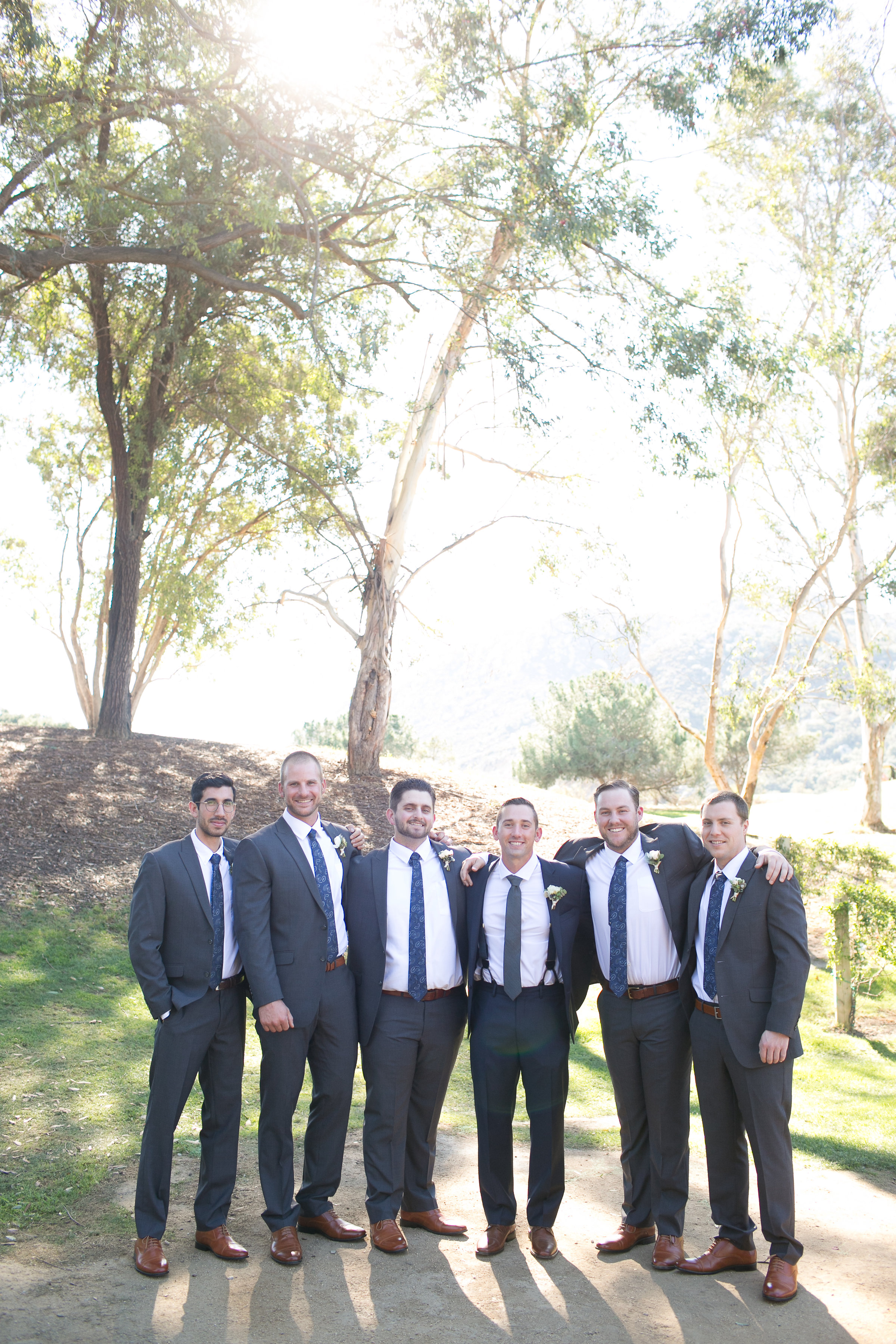 Groomsmen in black suits | Temecula Creek Inn Weddings | Compass Floral Design | Wedding Florist in San Diego and Southern California | Allie Lindsey Photography