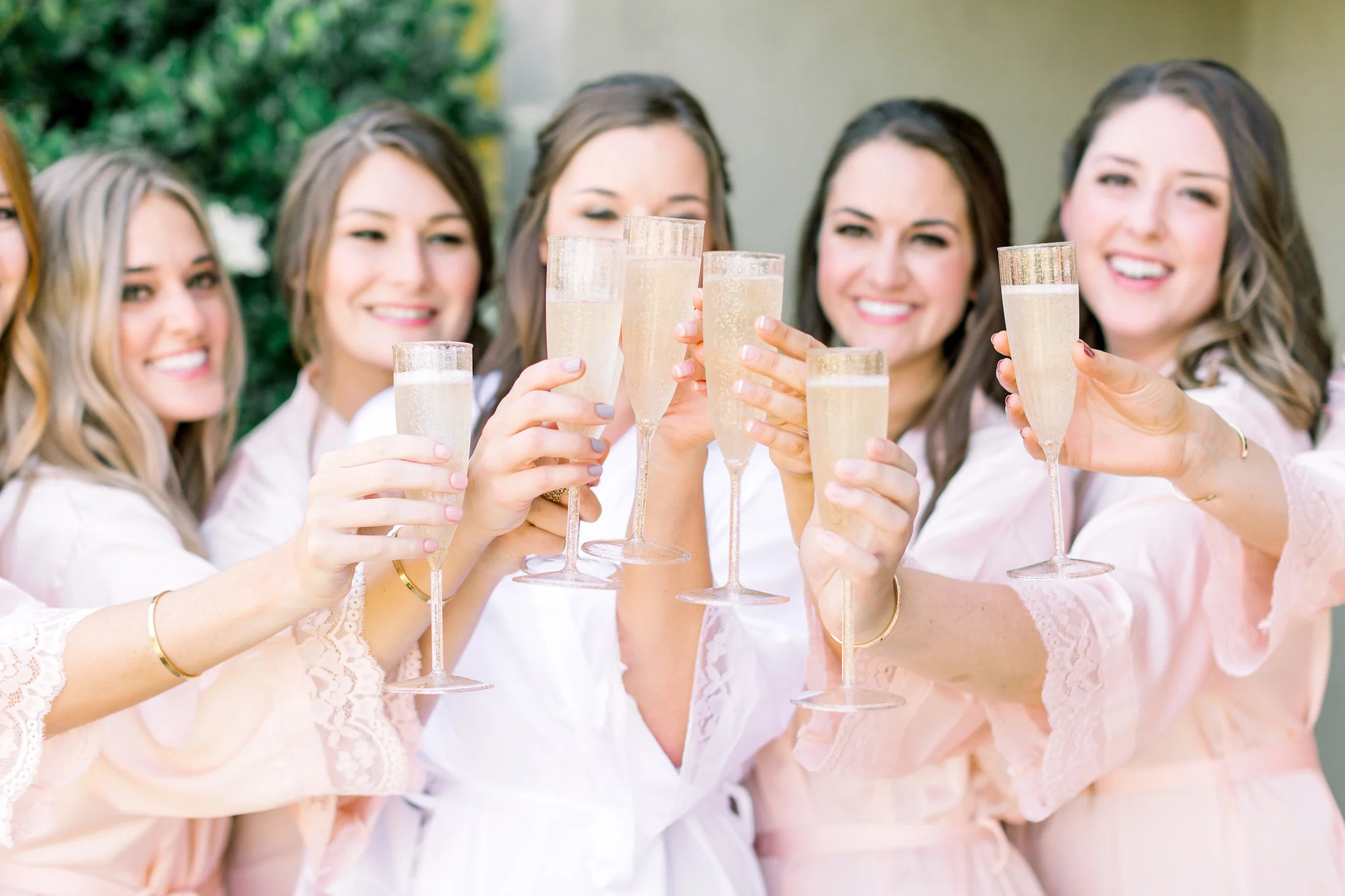 Bridal party champagne cheers | Temecula Creek Inn | Compass Floral | Wedding Florist in San Diego and Southern California | Pauline Conway Photography