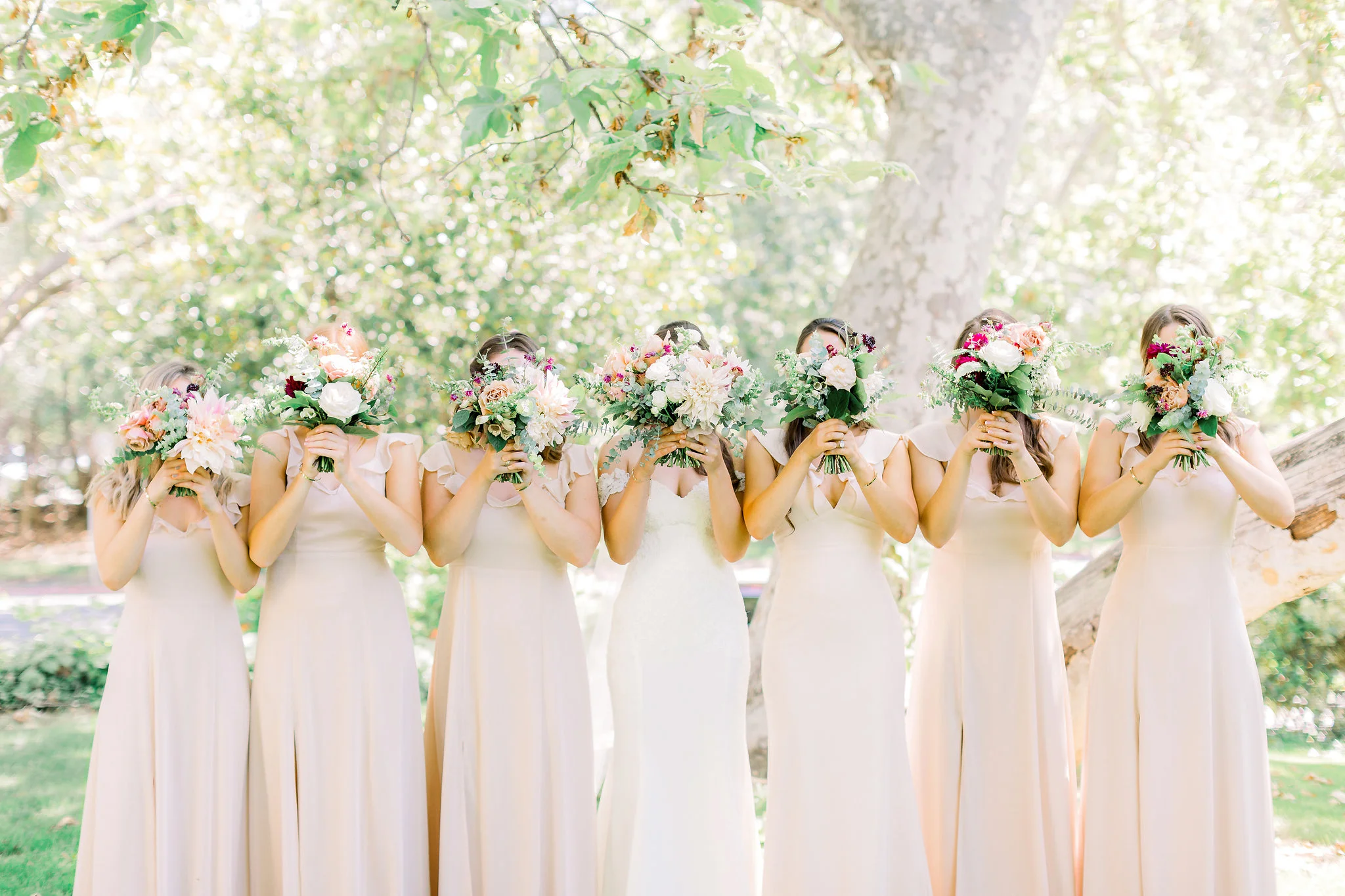 Dusty rose bridesmaid dresses | Temecula Creek Inn | Compass Floral | Wedding Florist in San Diego and Southern California | Pauline Conway Photography