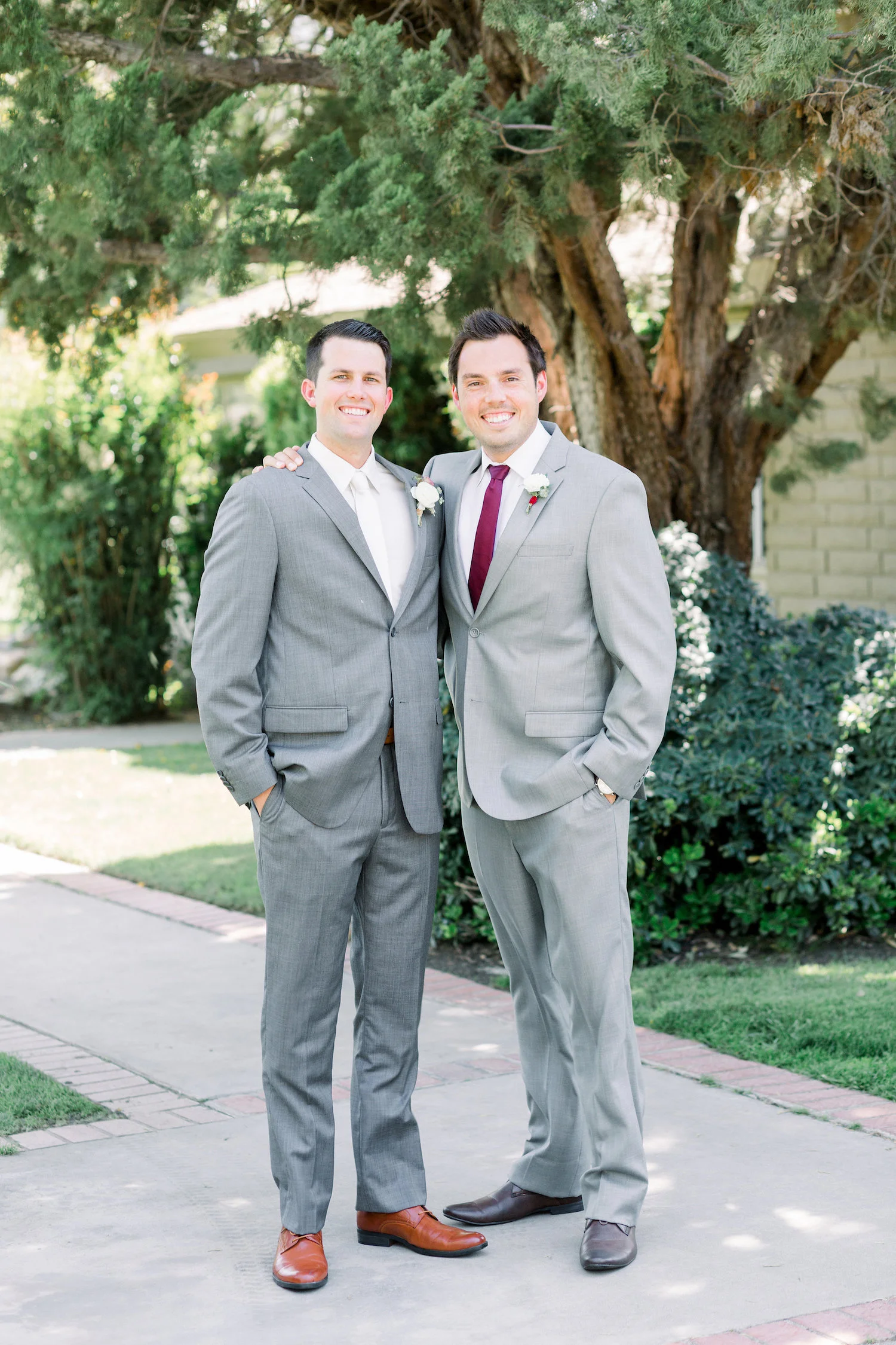 Groom and groomsmen in gray suits, burgundy ties | Temecula Creek Inn | Compass Floral | Wedding Florist in San Diego and Southern California | Pauline Conway Photography