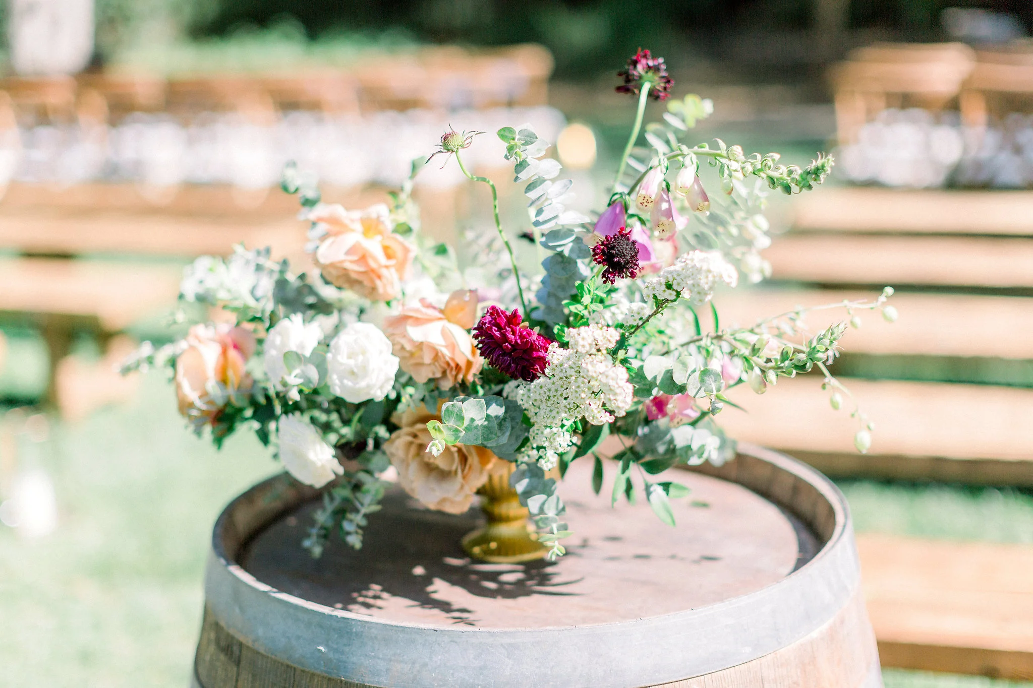 Wine barrel florals for wedding ceremony | Temecula Creek Inn | Compass Floral | Wedding Florist in San Diego and Southern California | Pauline Conway Photography