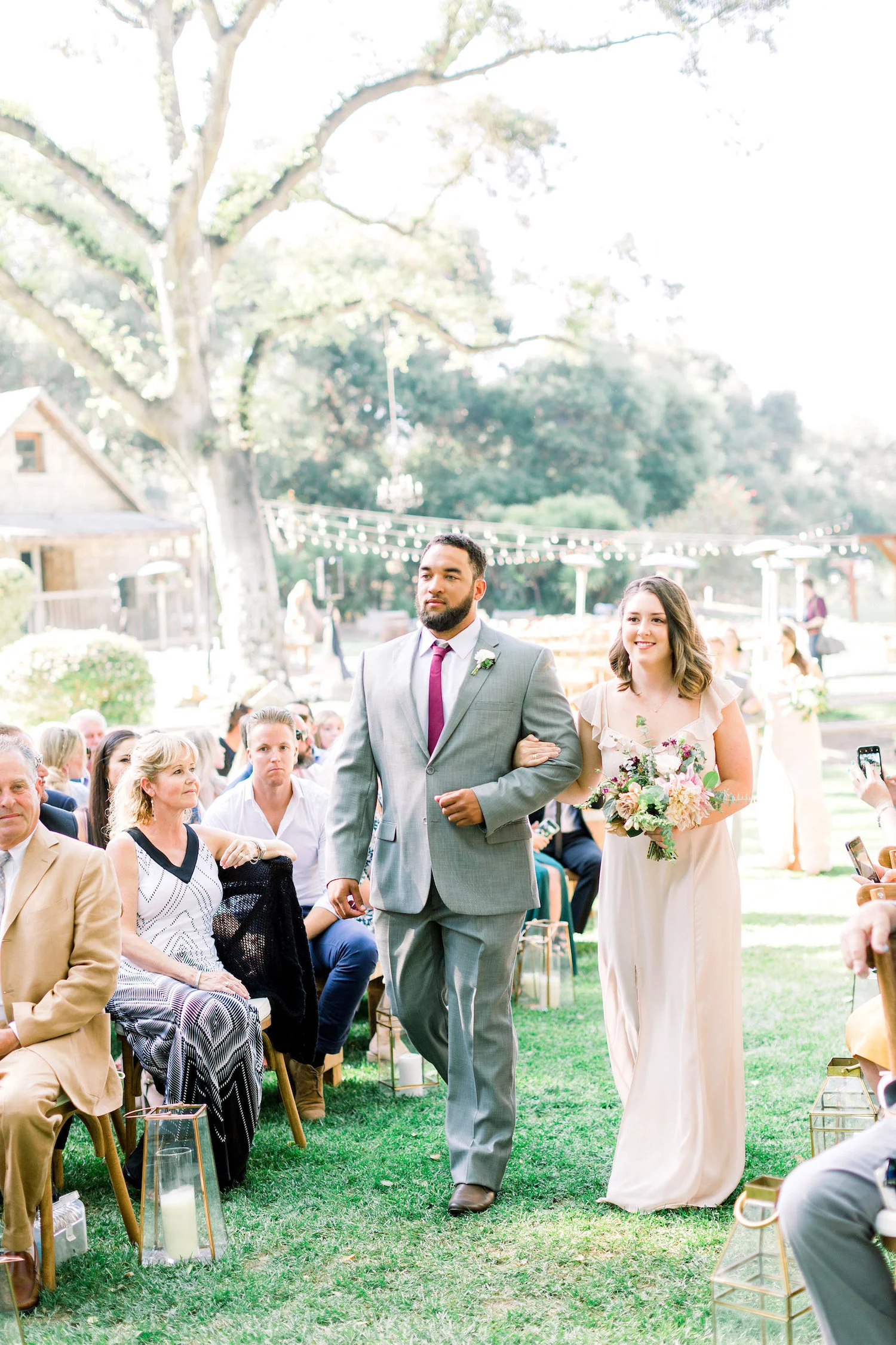 Outdoor San Diego wedding ceremony | Temecula Creek Inn | Compass Floral | Wedding Florist in San Diego and Southern California | Pauline Conway Photography
