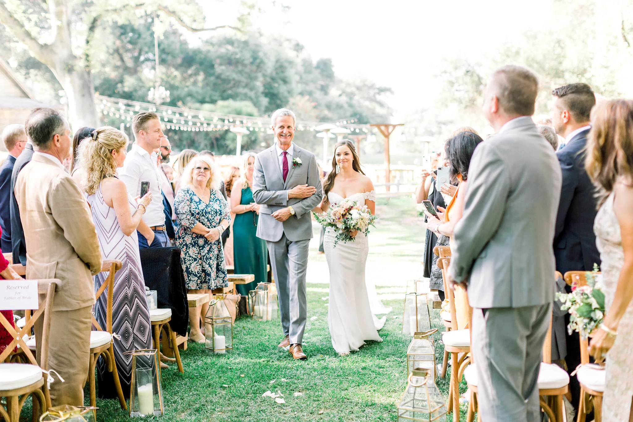 Bride walking down the aisle | Temecula Creek Inn | Compass Floral | Wedding Florist in San Diego and Southern California | Pauline Conway Photography