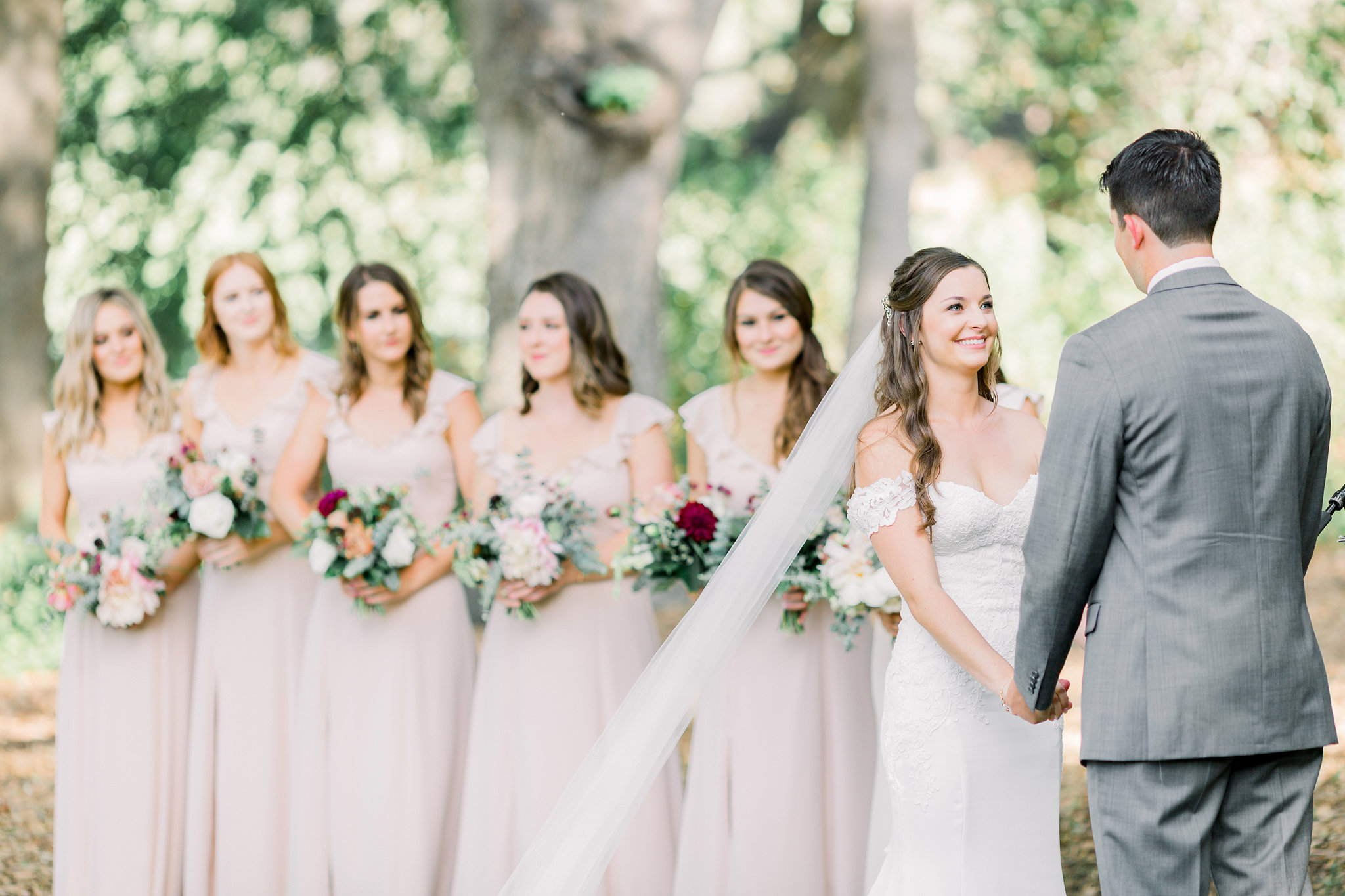 Bridesmaids in blush dresses | Temecula Creek Inn | Compass Floral | Wedding Florist in San Diego and Southern California | Pauline Conway Photography