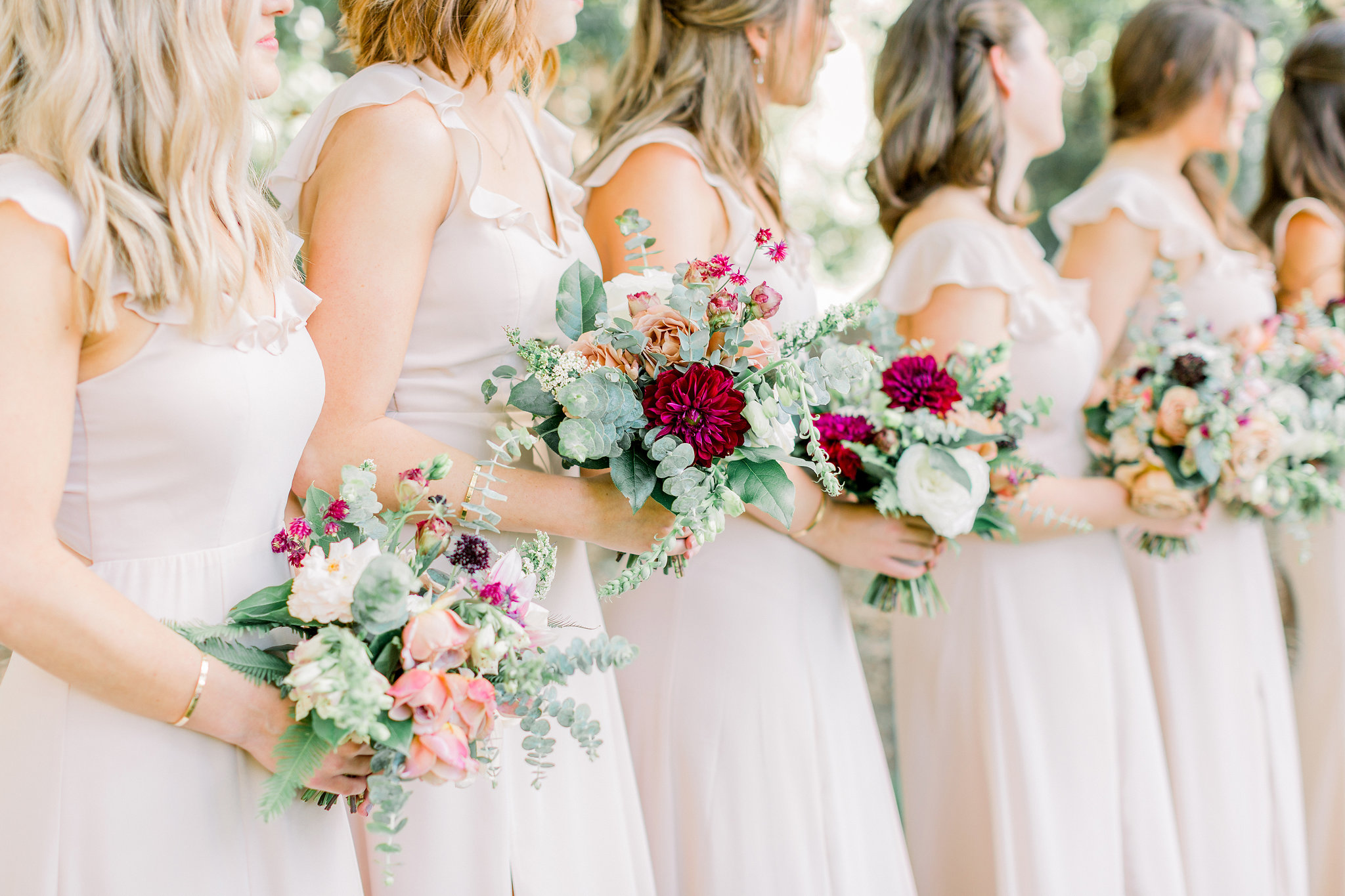 Mauve, blush, ivory and burgundy bridesmaid bouquets | Temecula Creek Inn | Compass Floral | Wedding Florist in San Diego and Southern California | Pauline Conway Photography