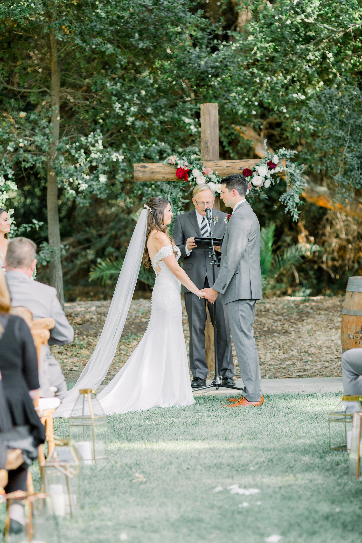 Outdoor cross wedding ceremony | Temecula Creek Inn | Compass Floral | Wedding Florist in San Diego and Southern California | Pauline Conway Photography