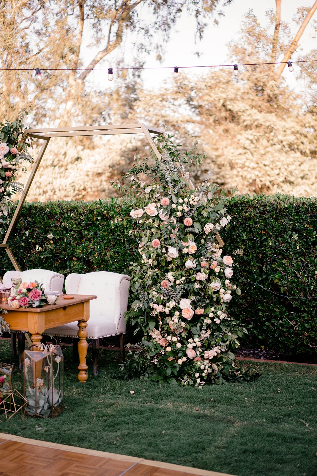 Sweetheart table geometric backdrop | The Inn at Rancho Santa Fe | Compass Floral | Wedding Florist in San Diego and Southern California | Shane and Lauren Photography