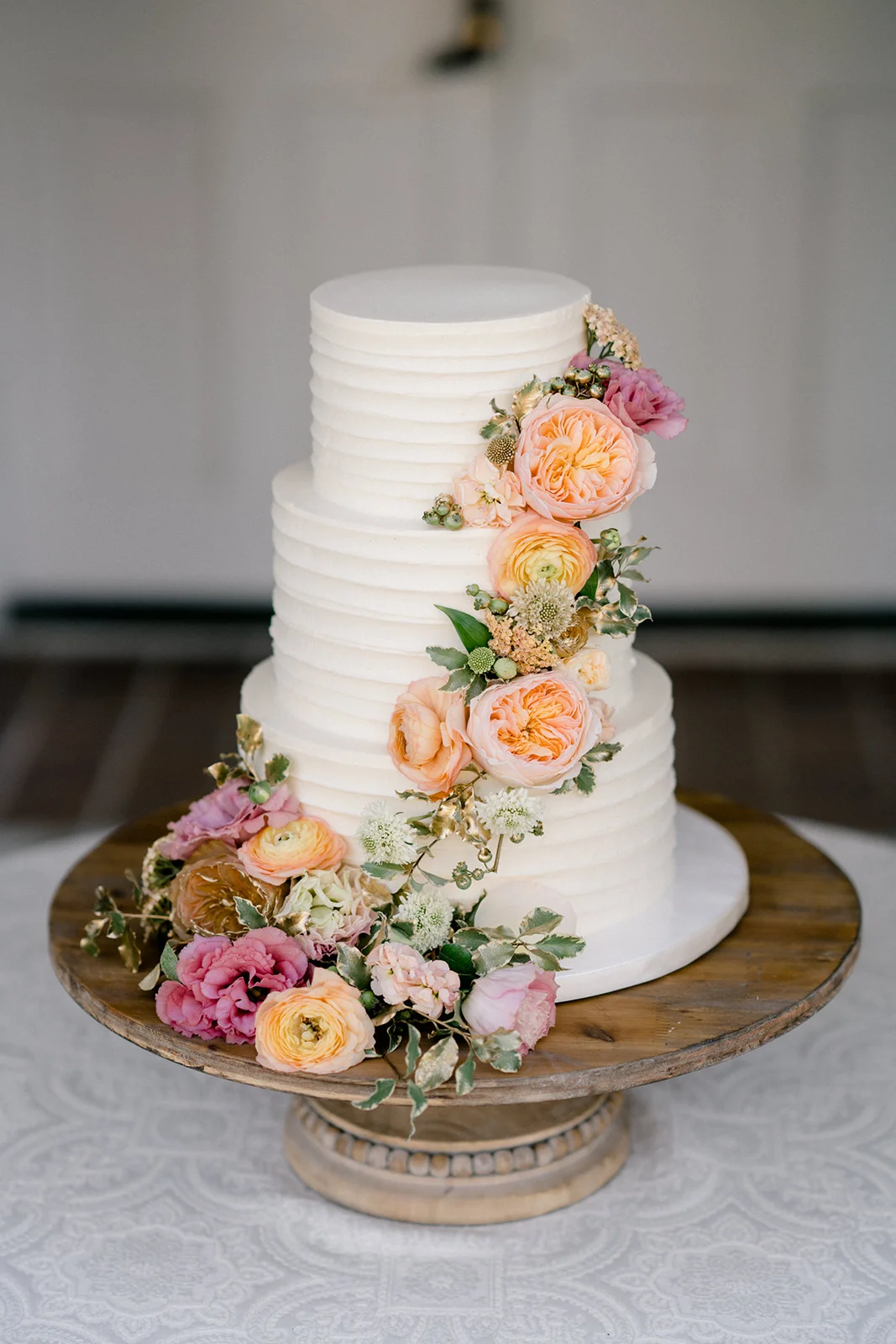 Pink peach and blush wedding cake flowers | The Inn at Rancho Santa Fe | Compass Floral | Wedding Florist in San Diego and Southern California | Shane and Lauren Photography