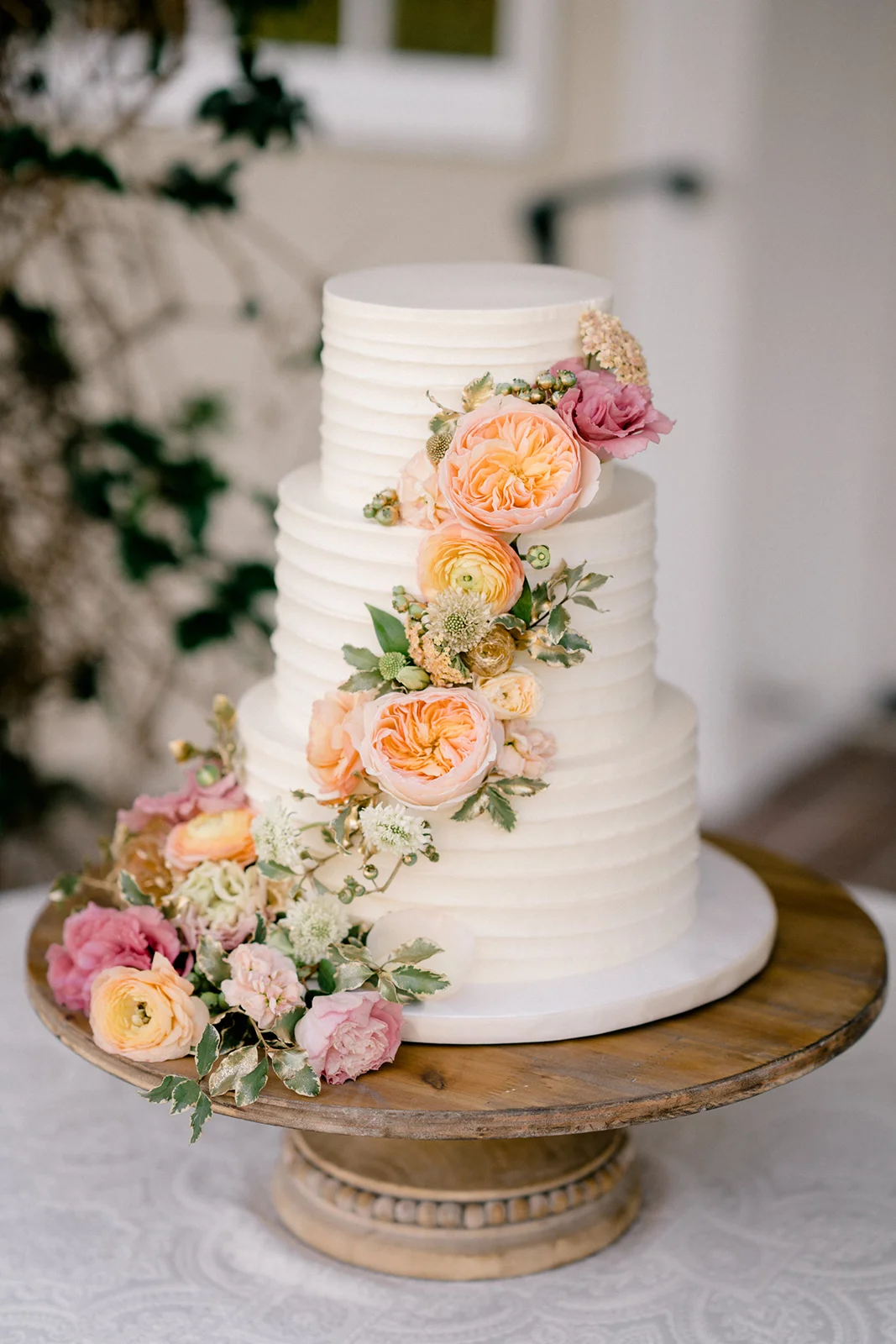 Elegant wedding cake flowers | The Inn at Rancho Santa Fe | Compass Floral | Wedding Florist in San Diego and Southern California | Shane and Lauren Photography