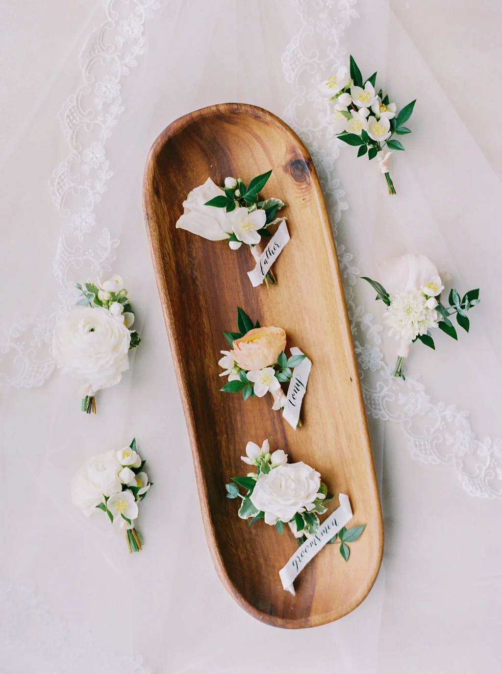 Simple mock orange and ranunculus boutonnieres | San Diego | Compass Floral | Wedding Florist in San Diego and Southern California | Meiwen Wang Photography