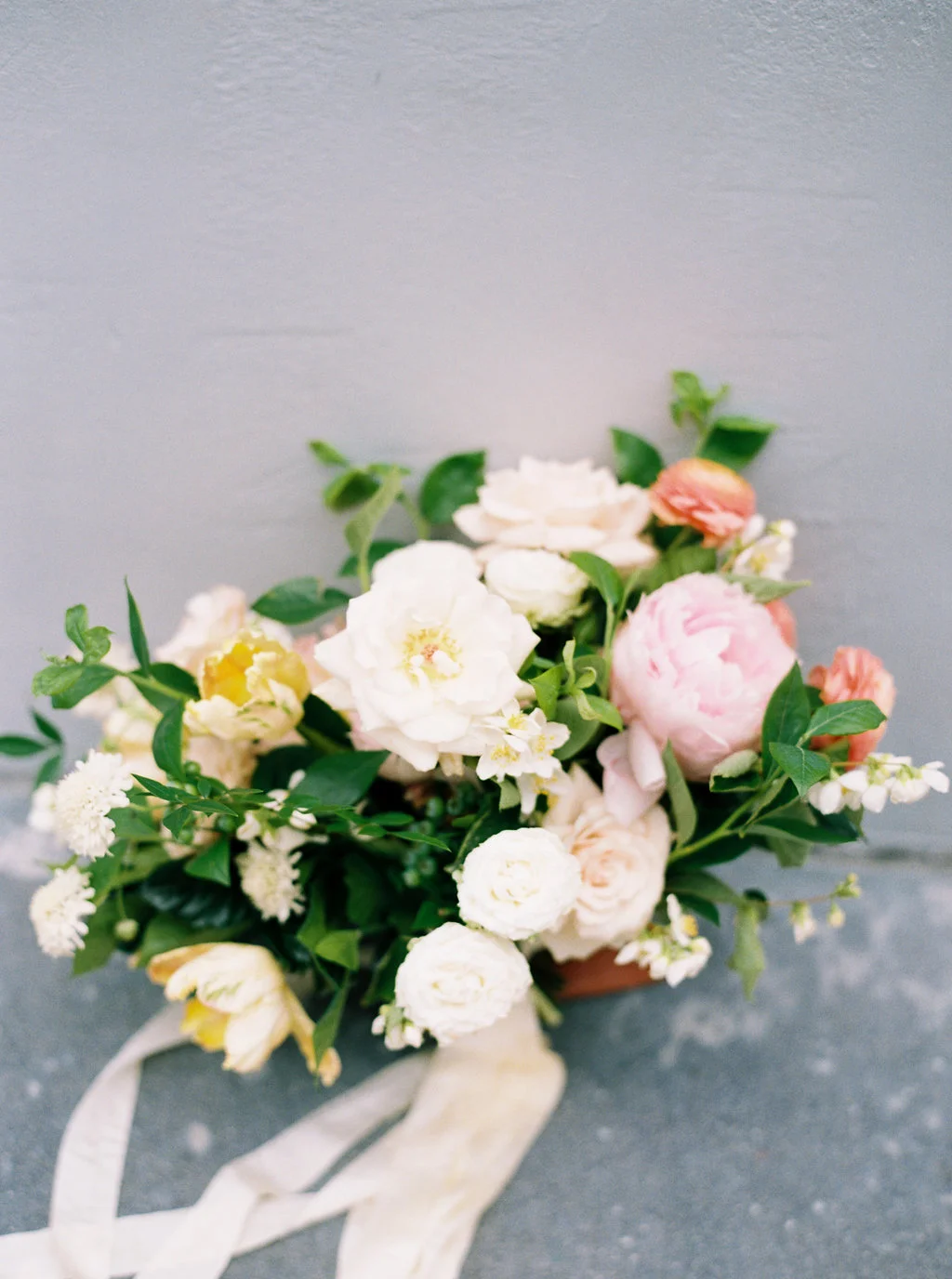 Pastel bridal bouquet of peonies, roses and tulips | The New Children’s Museum | Compass Floral | Wedding Florist in San Diego and Southern California | Meiwen Wang Photography