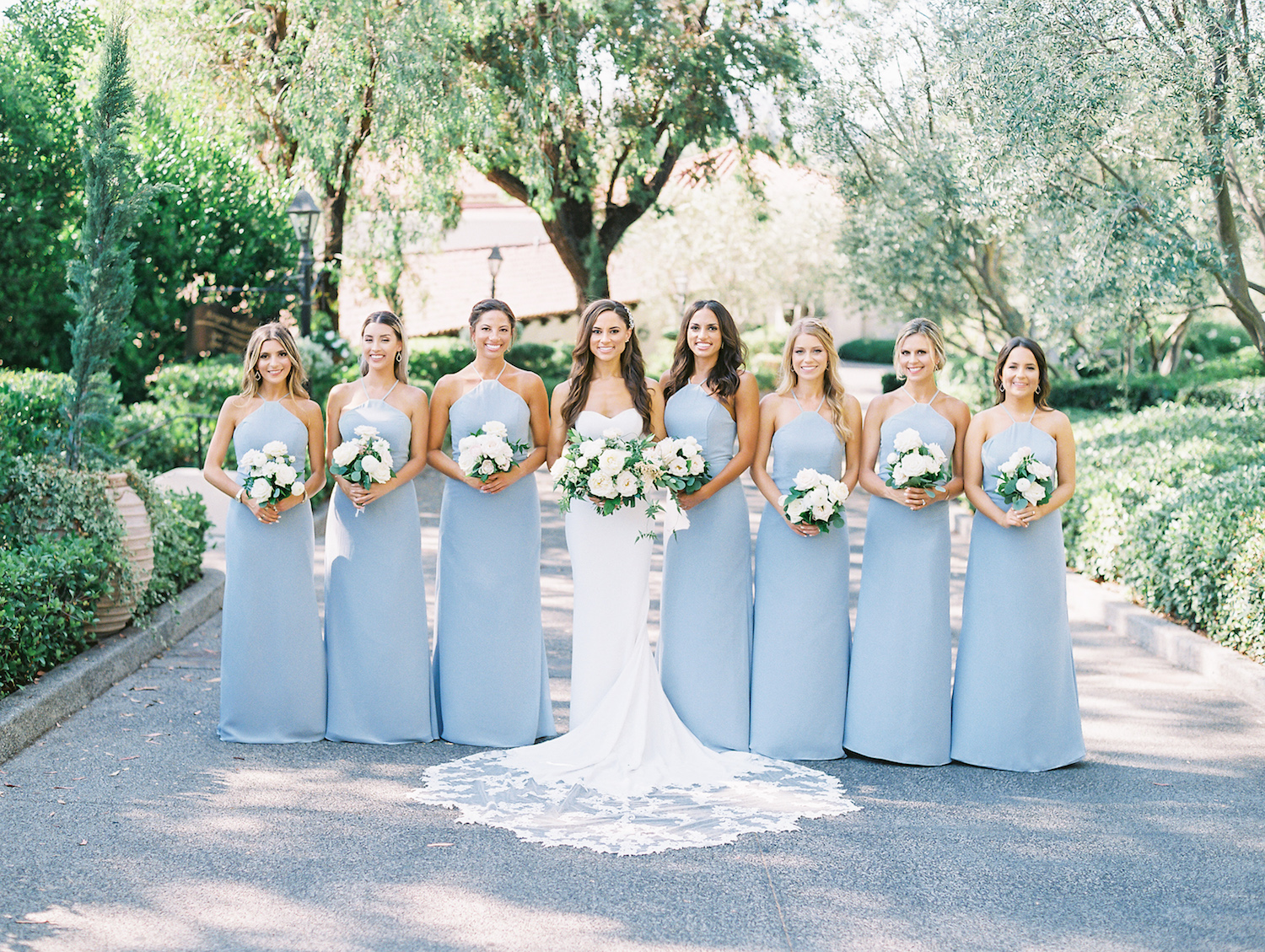 Light blue bridesmaid dresses with white flowers | Rancho Bernardo Inn | Compass Floral | Wedding Florist in San Diego and Southern California | Dear Lovers Photography