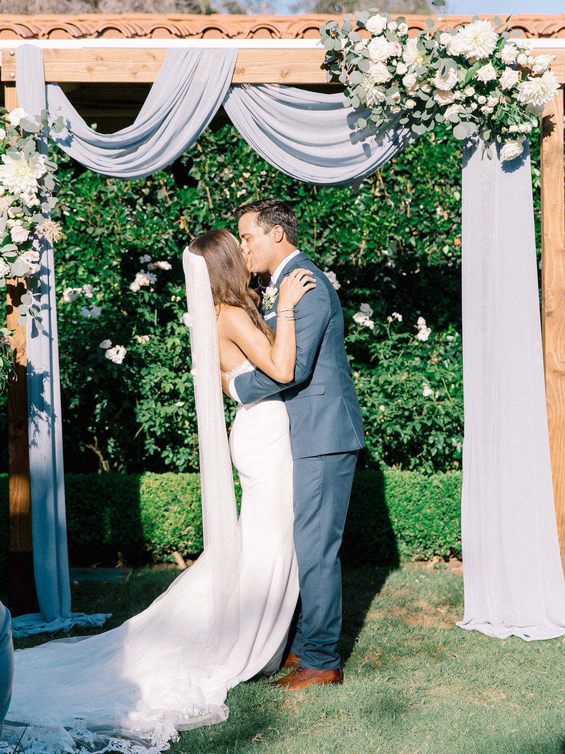 Fabric draped wood ceremony arch with white flowers | Rancho Bernardo Inn | Compass Floral | Wedding Florist in San Diego and Southern California | Dear Lovers Photography