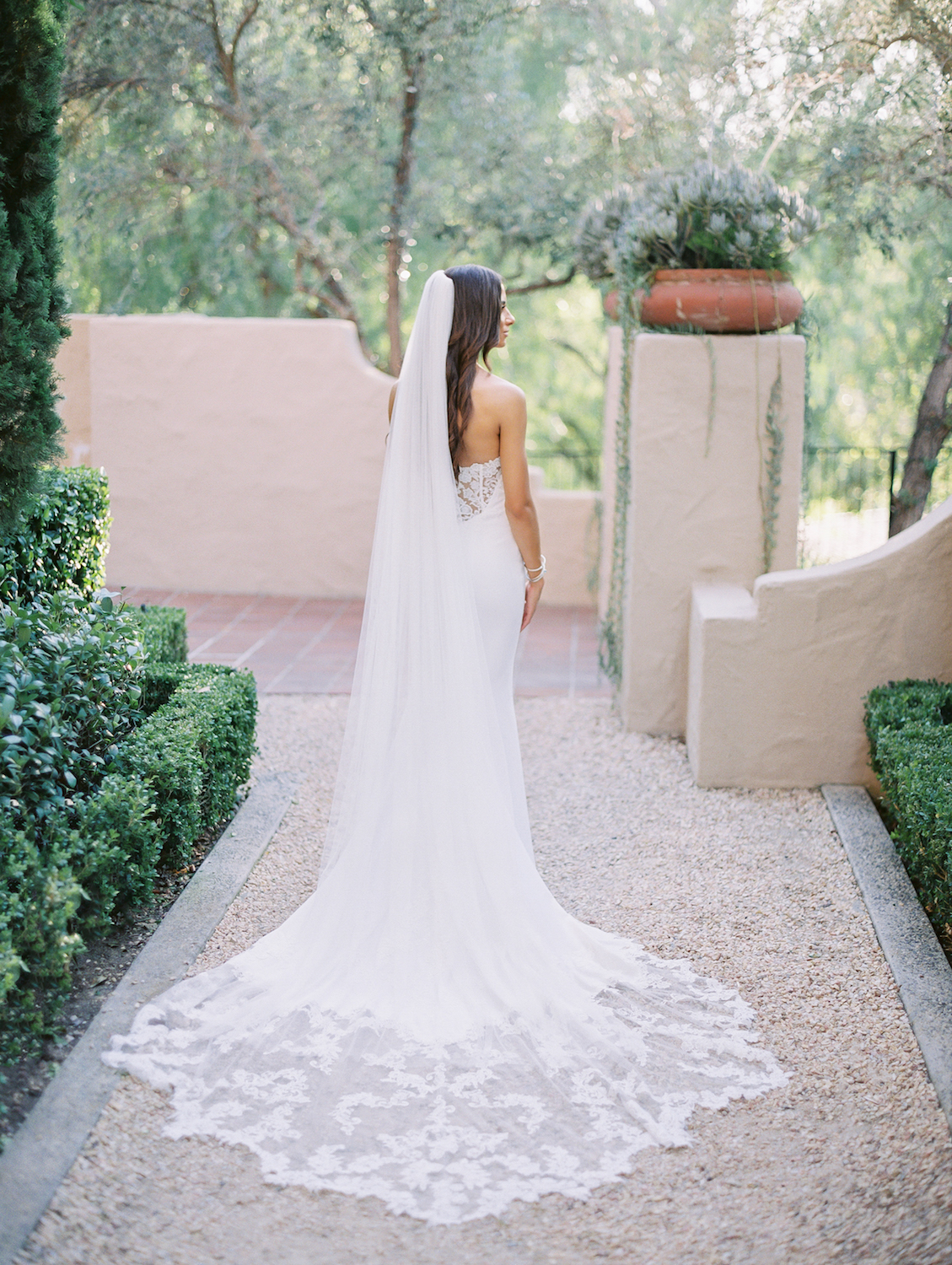 Outdoor bride portrait with lace wedding dress train | Rancho Bernardo Inn | Compass Floral | Wedding Florist in San Diego and Southern California | Dear Lovers Photography