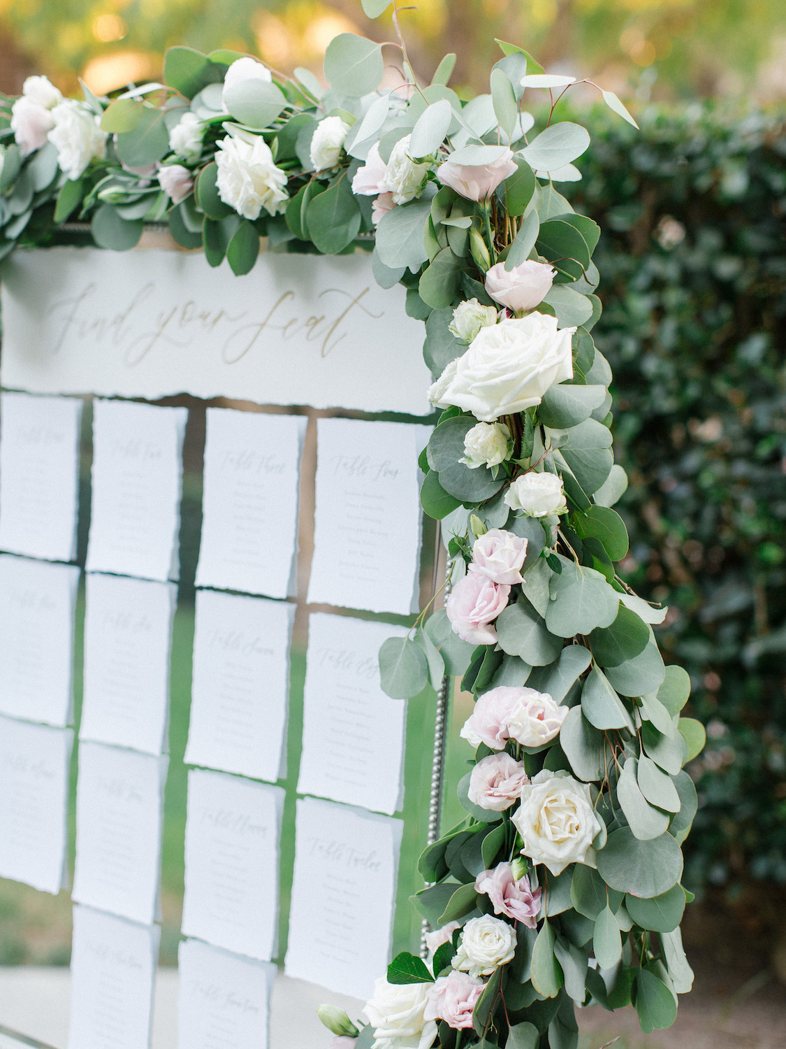 Mirror escort card display with floral garland | Rancho Bernardo Inn | Compass Floral | Wedding Florist in San Diego and Southern California | Dear Lovers Photography