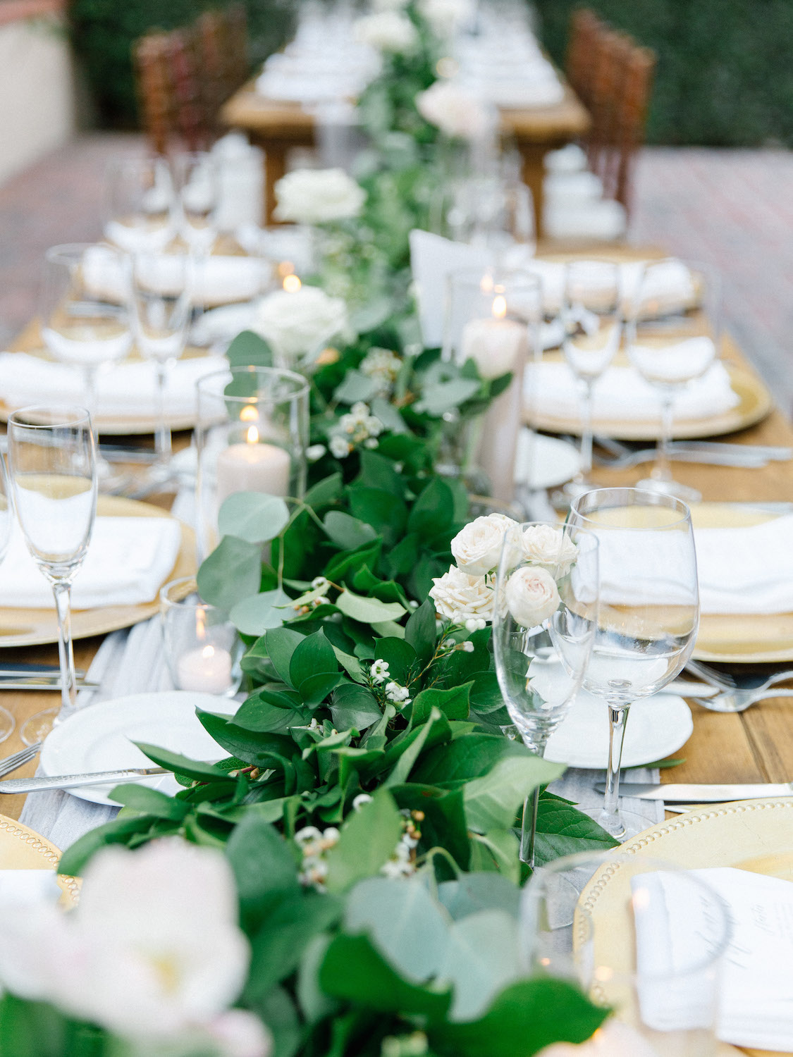 Garland and pillar candle wedding centerpiece | Rancho Bernardo Inn | Compass Floral | Wedding Florist in San Diego and Southern California | Dear Lovers Photography